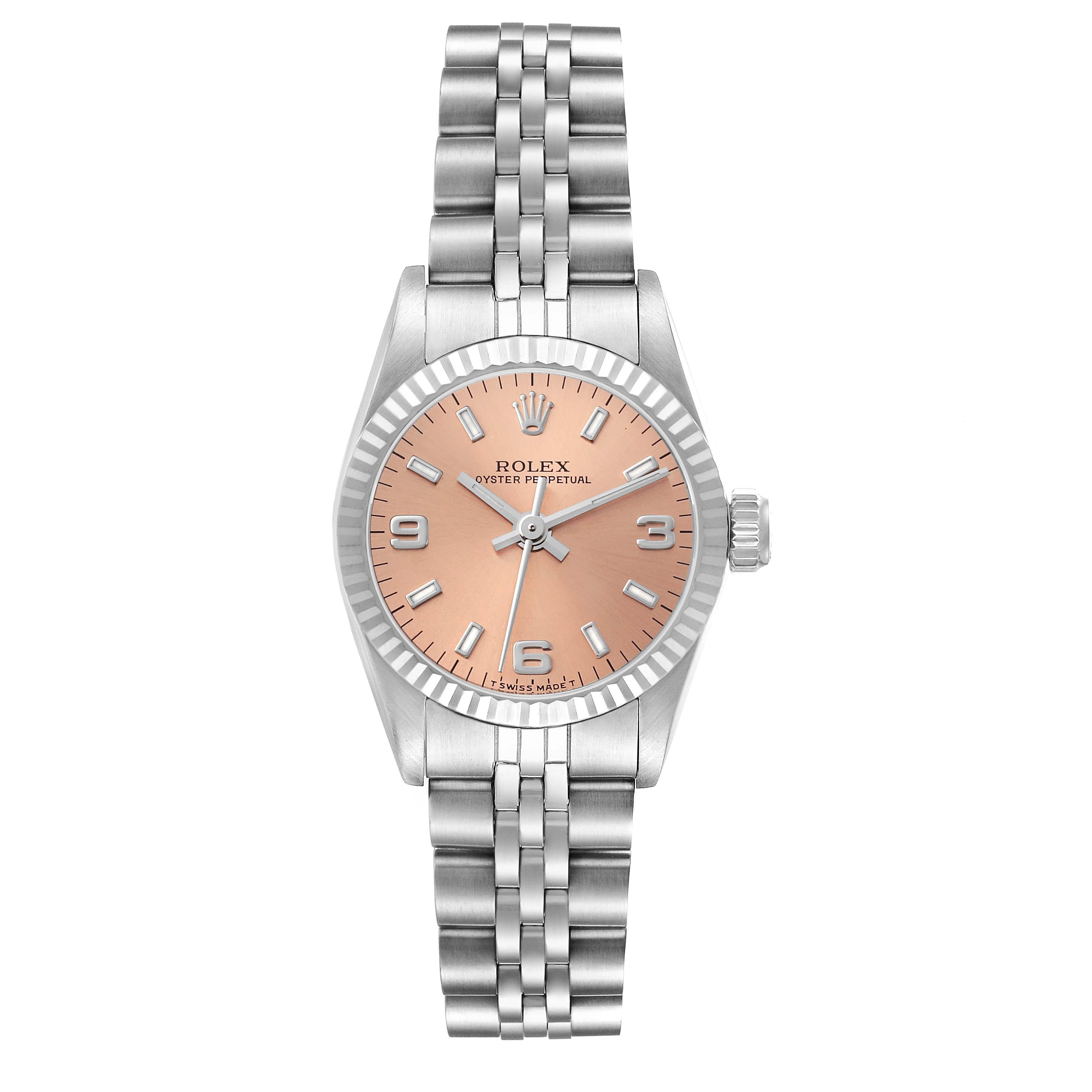 Rolex Oyster Perpetual Salmon Steel White Gold Ladies Watch 67194 Box Papers. Officially certified chronometer automatic self-winding movement. Stainless steel oyster case 24.0 mm in diameter. Rolex logo on the crown. 18k white gold fluted bezel.
