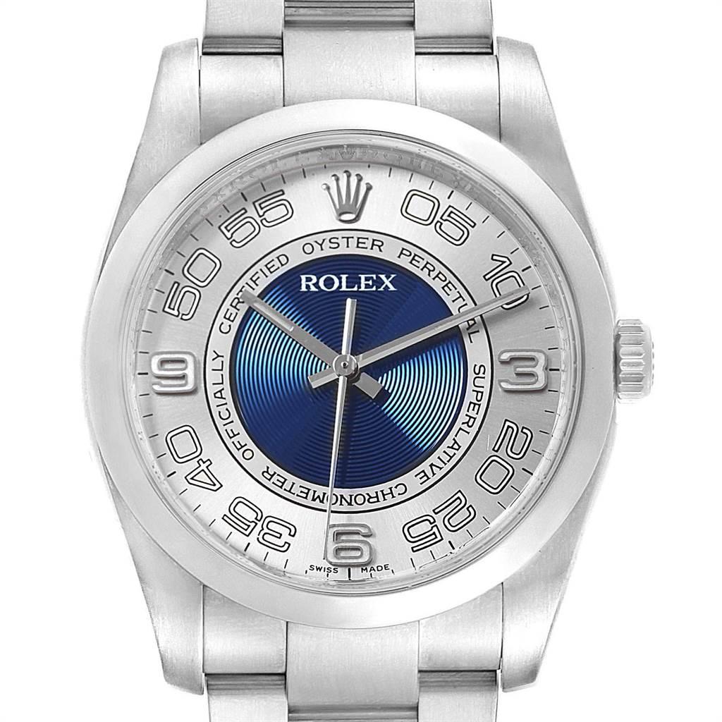 Rolex Oyster Perpetual Silver Blue Concentric Dial Unisex Watch 116000. Officially certified chronometer self-winding movement. Stainless steel case 36.0 mm in diameter. Rolex logo on a crown. Stainless steel smooth domed bezel. Scratch resistant
