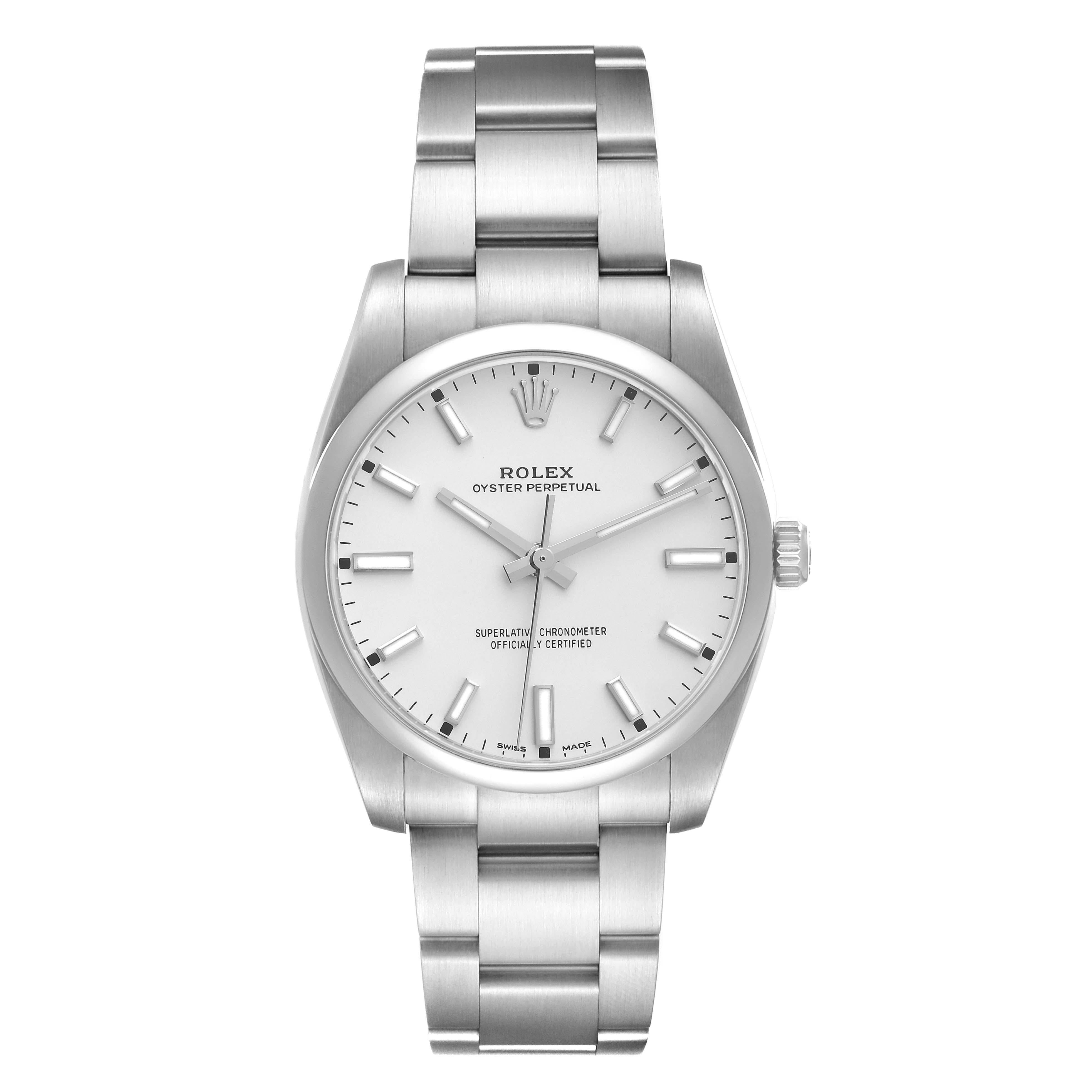 Rolex Oyster Perpetual Silver Dial Smooth Bezel Mens Watch 114200 Box Card. Officially certified chronometer self-winding movement. Stainless steel case 34 mm in diameter. Rolex logo on a crown. Stainless steel smooth domed bezel. Scratch resistant