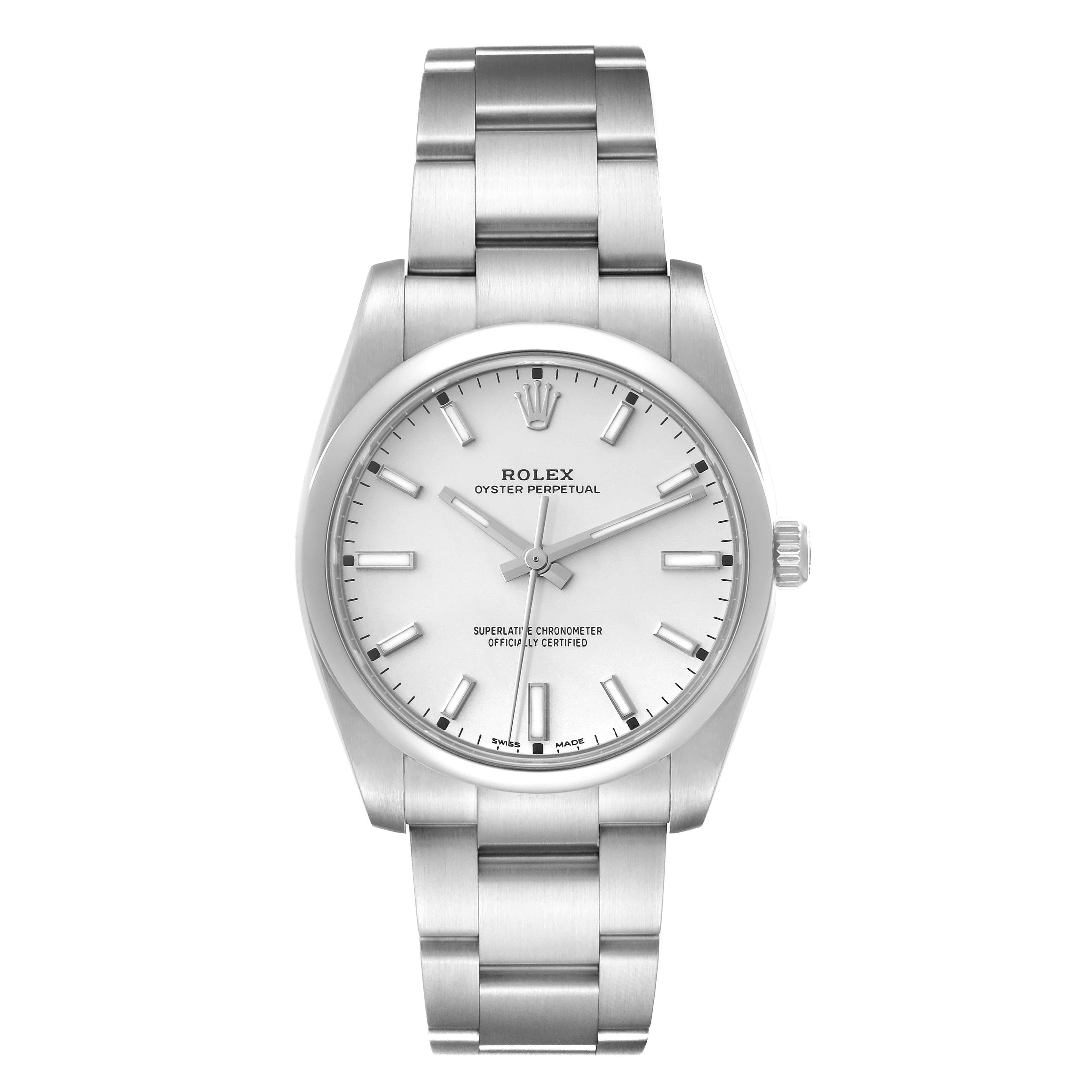 Rolex Oyster Perpetual Silver Dial Smooth Bezel Steel Mens Watch 114200 Box Card. Officially certified chronometer self-winding movement. Stainless steel case 34 mm in diameter. Rolex logo on a crown. Stainless steel smooth domed bezel. Scratch