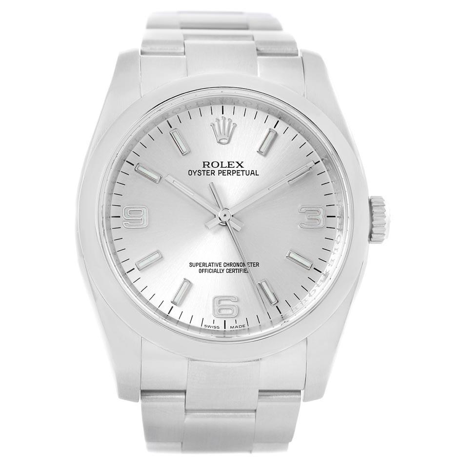 Rolex Oyster Perpetual Silver Dial Steel Mens Watch 116000 Box Papers. Officially certified chronometer self-winding movement. Stainless steel case 36.0 mm in diameter. Rolex logo on a crown. Stainless steel smooth domed bezel. Scratch resistant