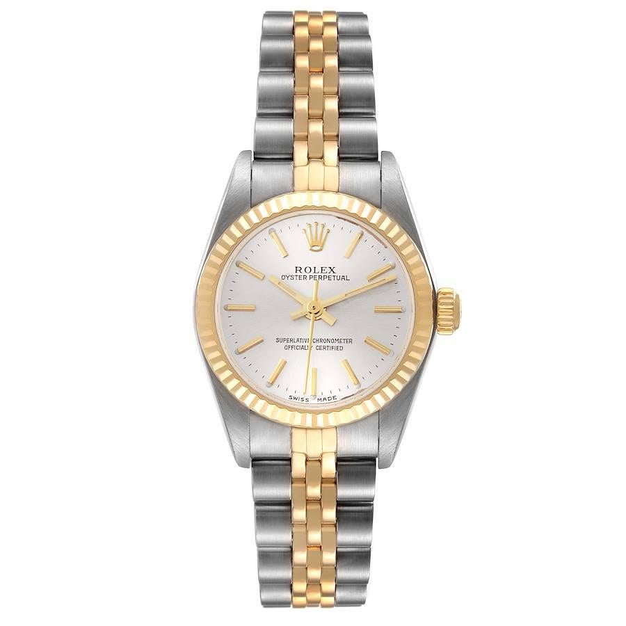 Rolex Oyster Perpetual Silver Dial Steel Yellow Gold Watch 76193. Officially certified chronometer self-winding movement. Stainless steel oyster case 24.0 mm in diameter. Rolex logo on a 18k yellow gold crown. 18k yellow gold fluted bezel. Scratch