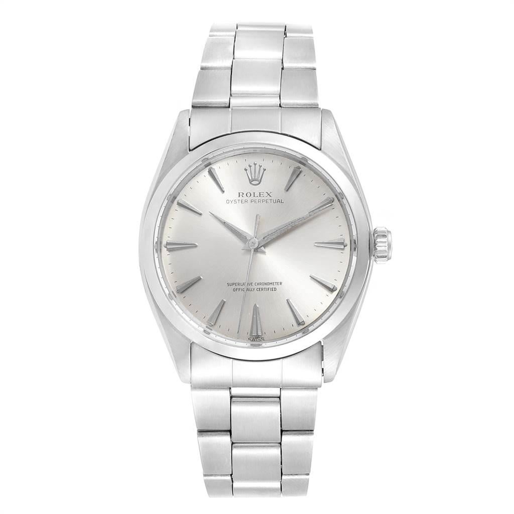 Rolex Oyster Perpetual Silver Dial Vintage Steel Mens Watch 1002. Officially certified chronometer self-winding movement. Stainless steel oyster case 34.0 mm in diameter.Rolex logo on a crown. Stainless steel smooth bezel. Acrylic crystal. Silver