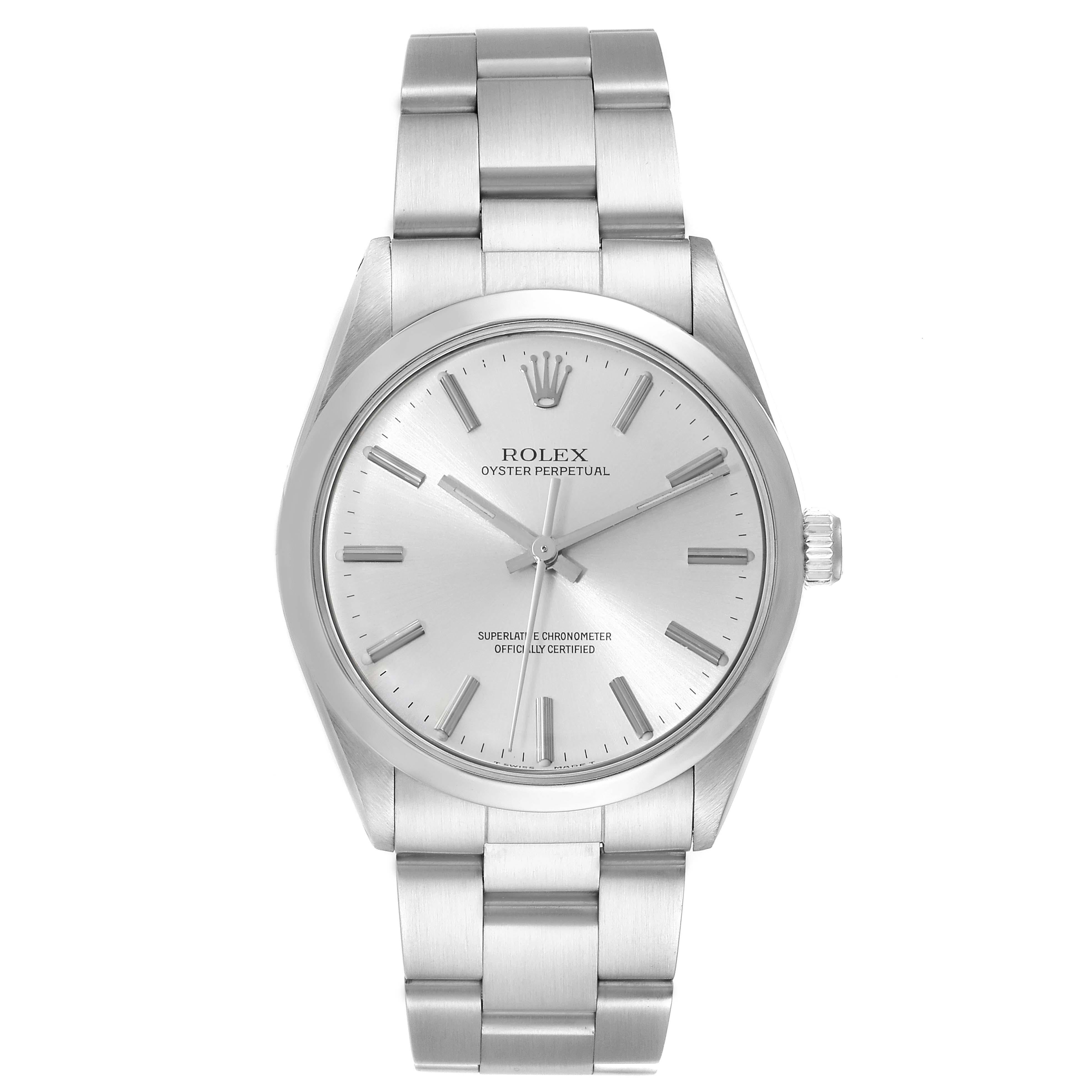 Rolex Oyster Perpetual Silver Dial Vintage Steel Mens Watch 1002. Officially certified chronometer automatic self-winding movement. Stainless steel oyster case 34.0 mm in diameter.  Rolex logo on the crown. Stainless steel smooth bezel. Domed