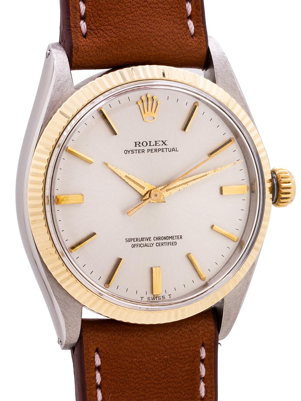 
A beautiful condition example Rolex Oyster Perpetual in SS and 14K yellow gold, ref 1005 serial# 1.3 million circa 1966. Featuring 34mm diameter Oyster case with screw down crown and case back, fluted 14K YG bezel, acrylic crystal, and original