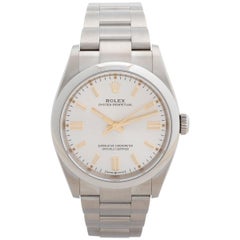 Used Rolex Oyster Perpetual, Stainless Steel, Silver Dial/Gold Batons, Box & Papers