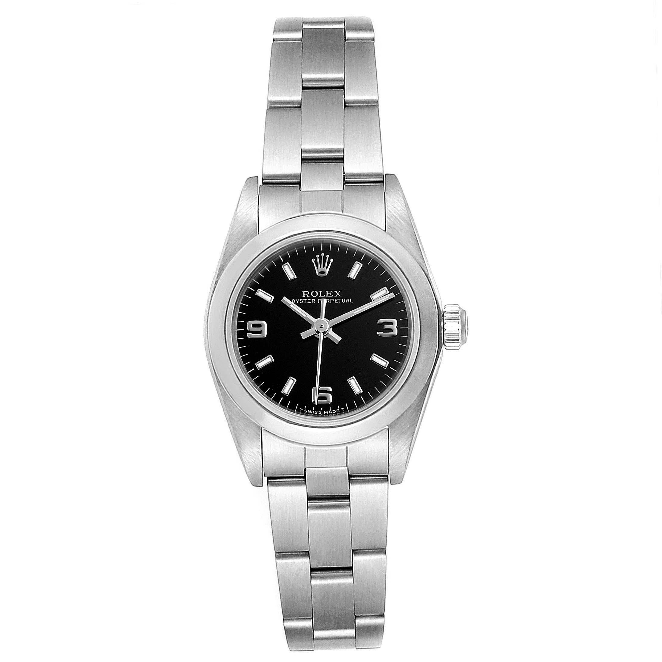 Rolex Oyster Perpetual Steel Black Dial Ladies Watch 67180 Box Papers. Officially certified chronometer self-winding movement. Stainless steel oyster case 24.0 mm in diameter. Rolex logo on a crown. Stainless steel smooth domed bezel. Scratch