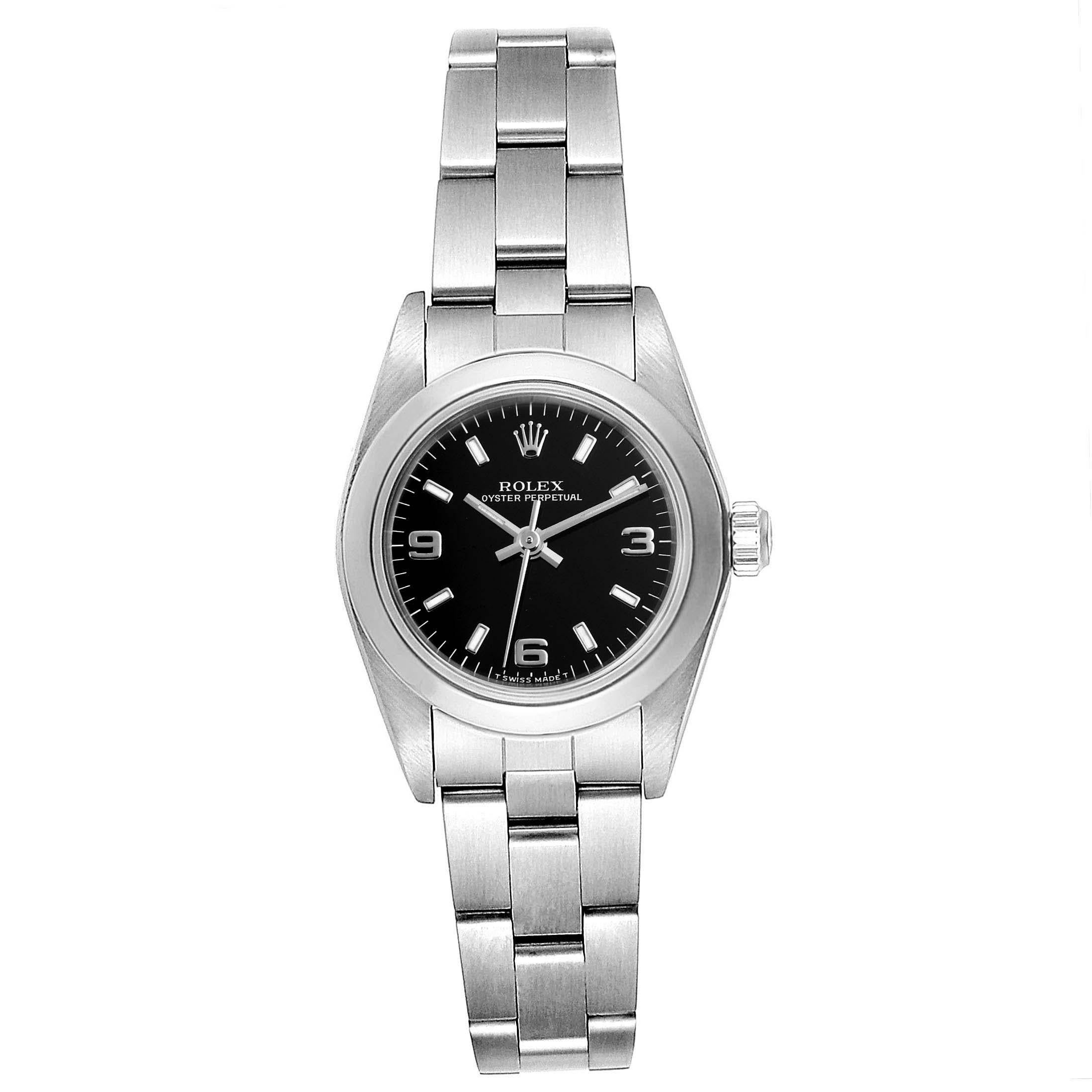 Rolex Oyster Perpetual Steel Black Dial Ladies Watch 67180 Box Papers. Officially certified chronometer self-winding movement. Stainless steel oyster case 24.0 mm in diameter. Rolex logo on a crown. Stainless steel smooth domed bezel. Scratch