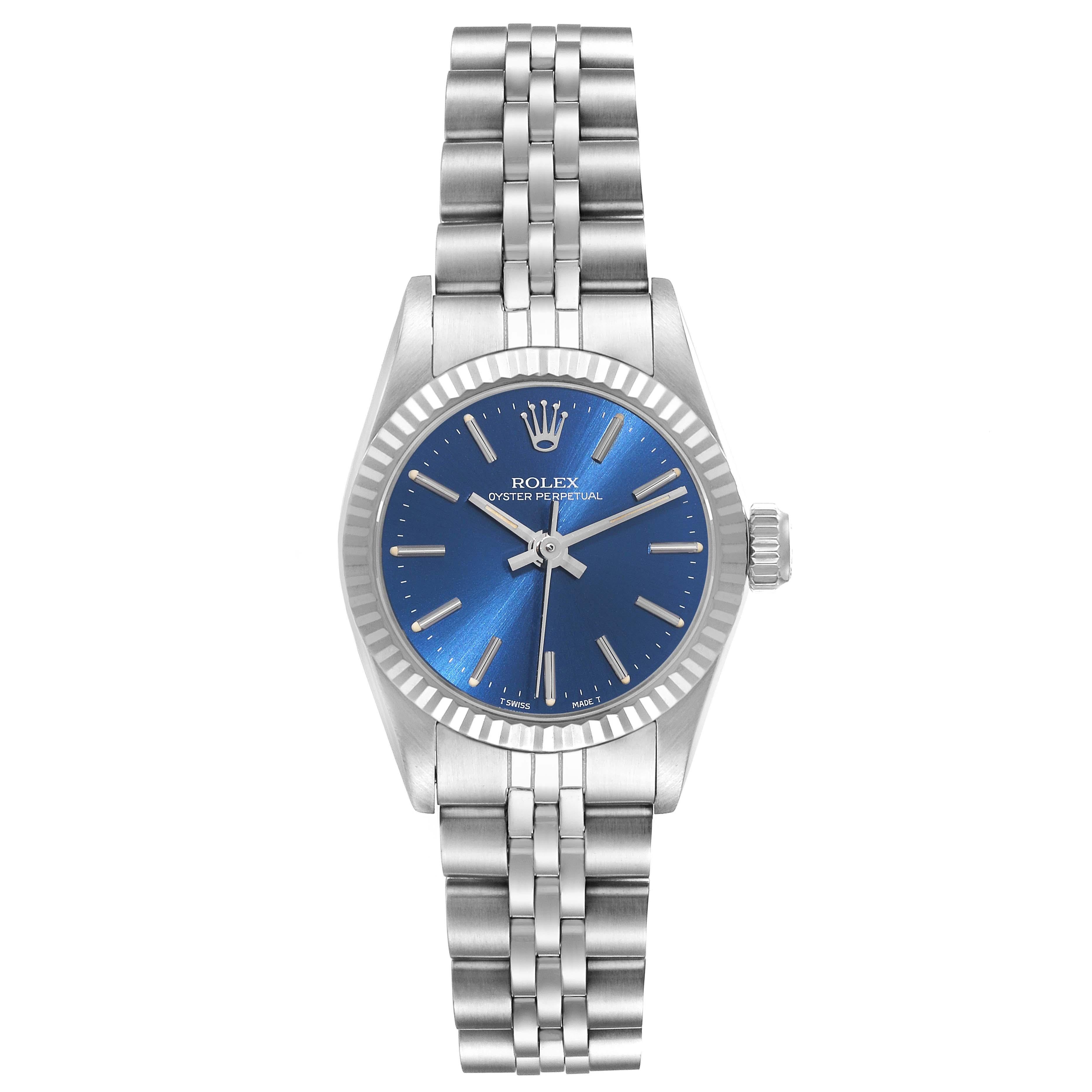 Rolex Oyster Perpetual Steel White Gold Ladies Watch 67194. Officially certified chronometer automatic self-winding movement. Stainless steel oyster case 24.0 mm in diameter. Rolex logo on the crown. 18k white gold fluted bezel. Scratch resistant