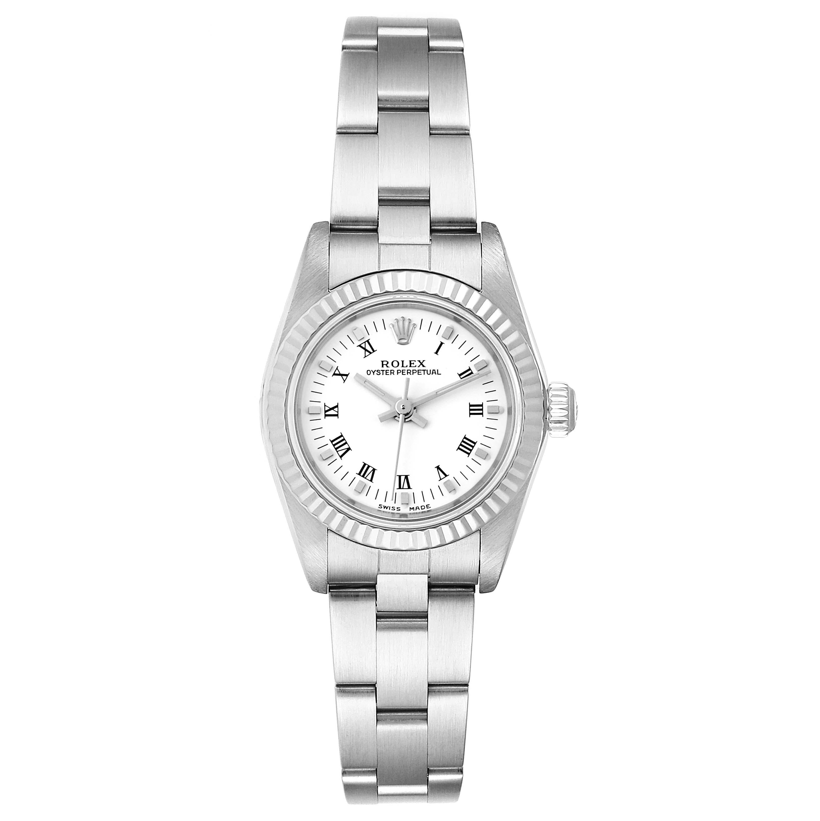 Rolex Oyster Perpetual Steel White Gold Ladies Watch 76094 Box Papers. Officially certified chronometer self-winding movement. Stainless steel oyster case 24.0 mm in diameter. Rolex logo on a crown. 18k white gold fluted bezel. Scratch resistant