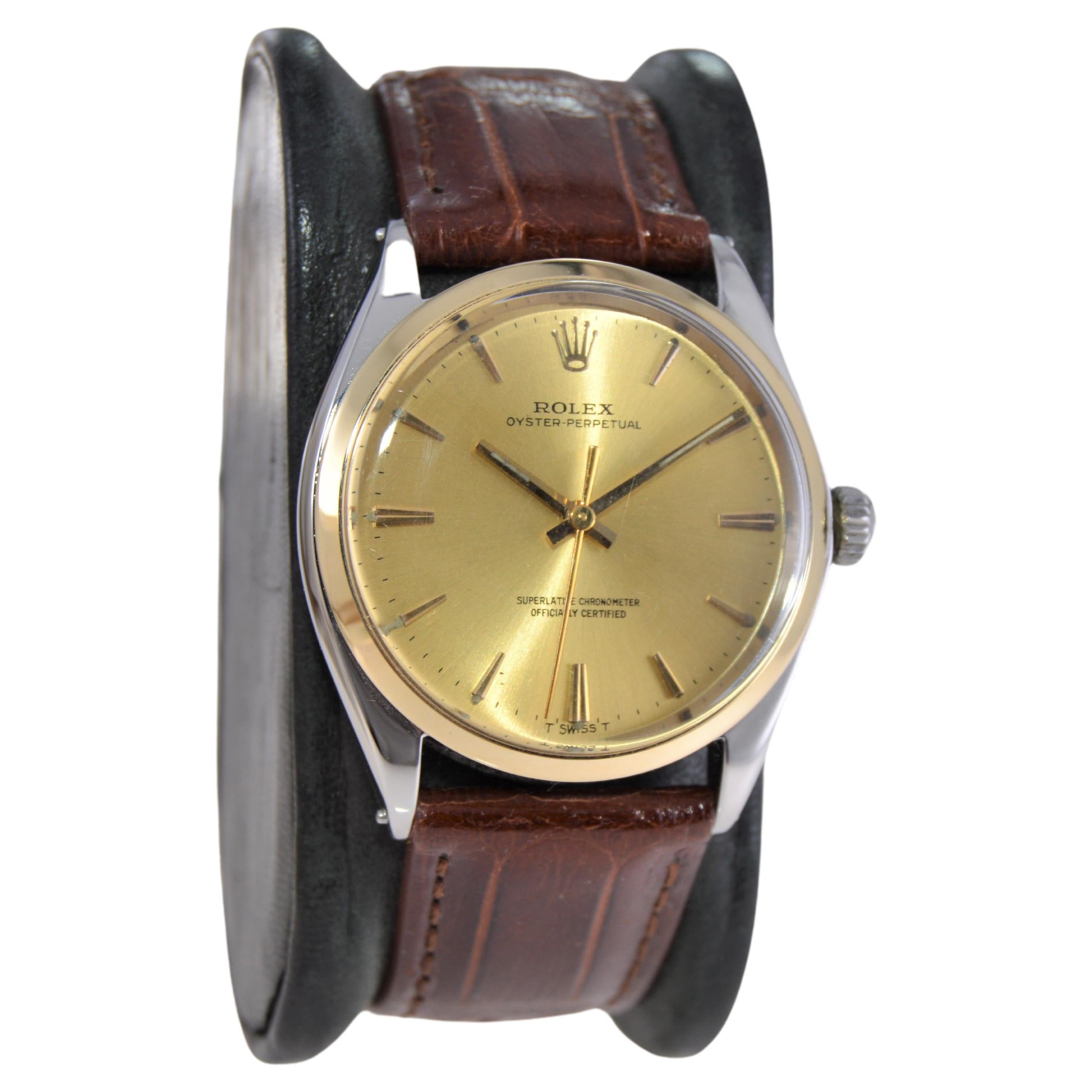 FACTORY / HOUSE: Rolex Watch Company
STYLE / REFERENCE: Oyster Perpetual / Reference 1005
METAL / MATERIAL: Two-Tone Steel and Solid Gold Bezel
CIRCA / YEAR: 1965
DIMENSIONS / SIZE: 40mm Length X 34mm Diameter
MOVEMENT / CALIBER: Perpetual Winding /