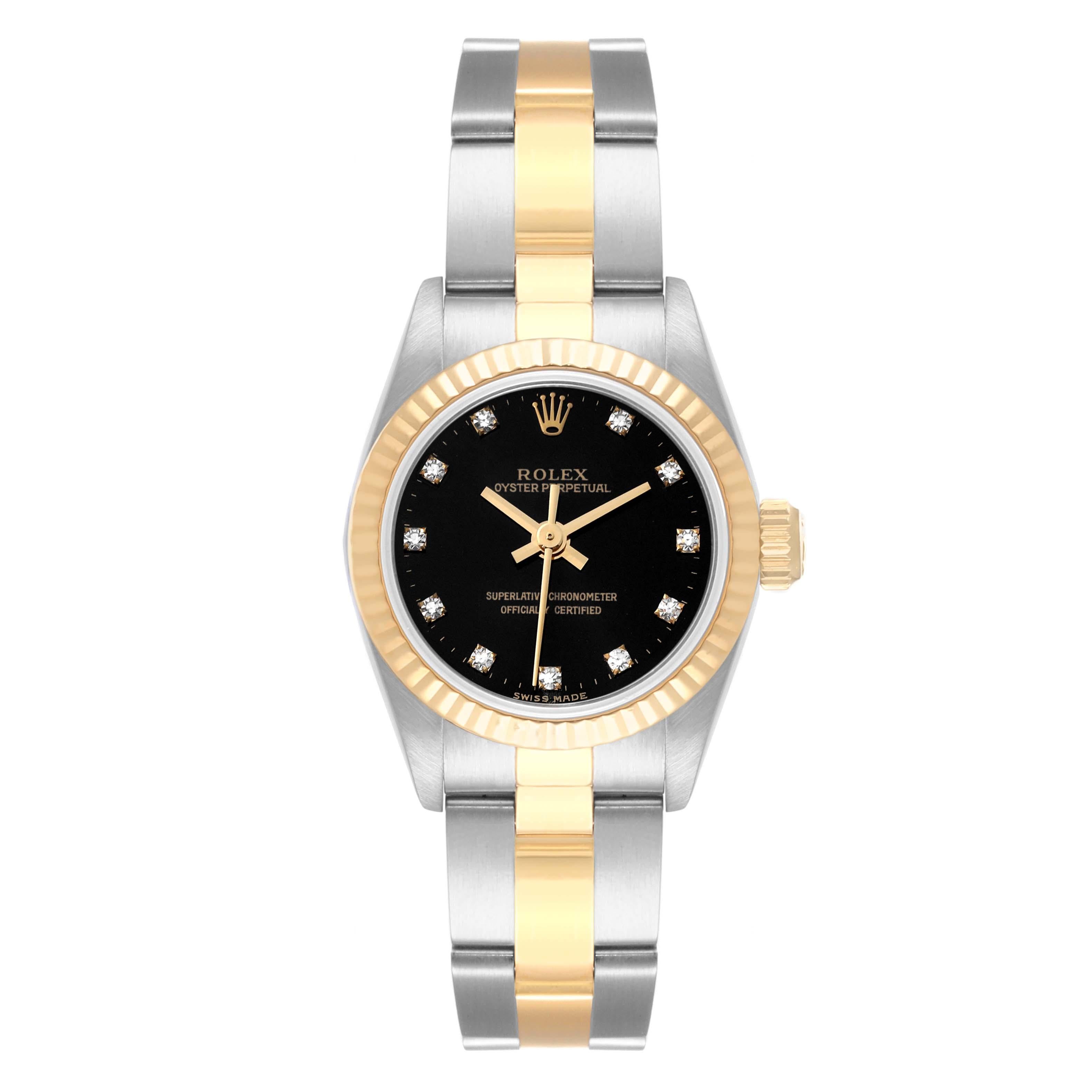 Rolex Oyster Perpetual Steel Yellow Gold Black Diamond Dial Ladies Watch 67193. Officially certified chronometer automatic self-winding movement. Stainless steel oyster case 24.0 mm in diameter. Rolex logo on an 18k yellow gold crown. 18k yellow