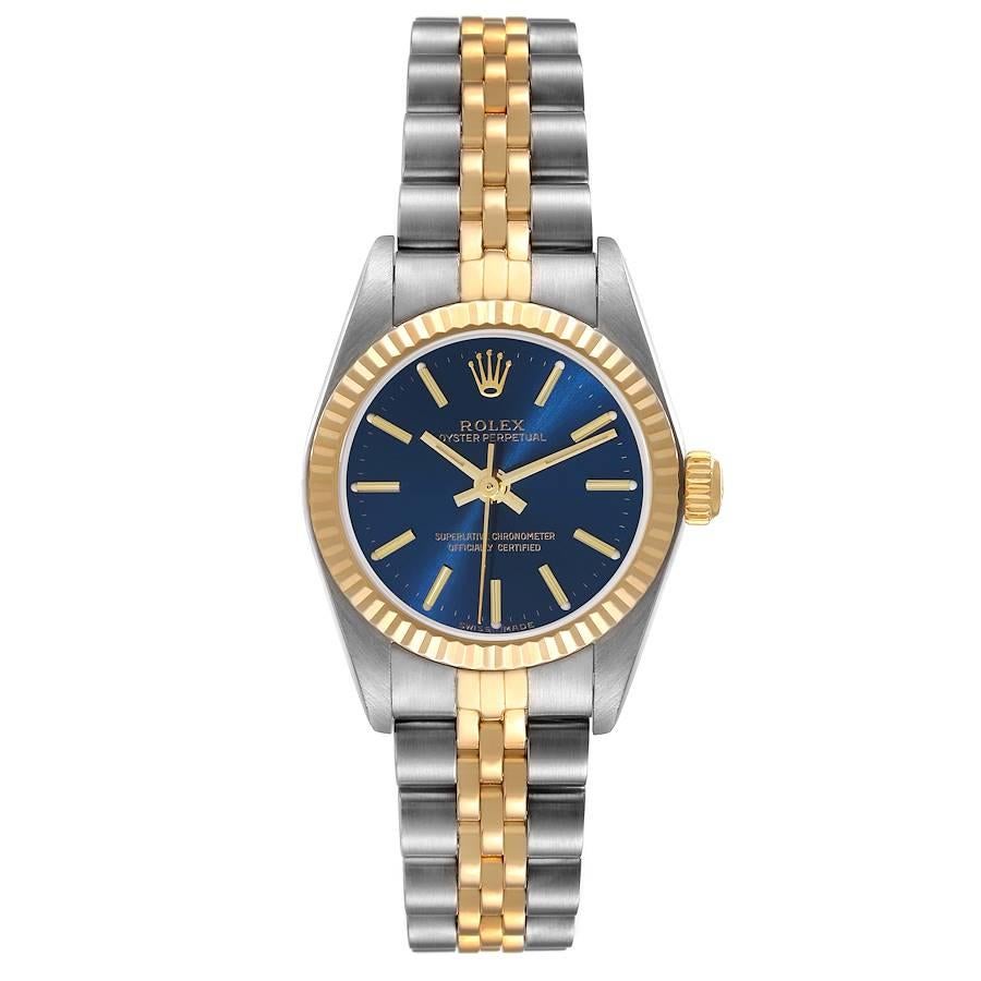 Rolex Oyster Perpetual Steel Yellow Gold Blue Dial Ladies Watch 76193. Officially certified chronometer self-winding movement. Stainless steel oyster case 24.0 mm in diameter. Rolex logo on a 18k yellow gold crown. 18k yellow gold fluted bezel.