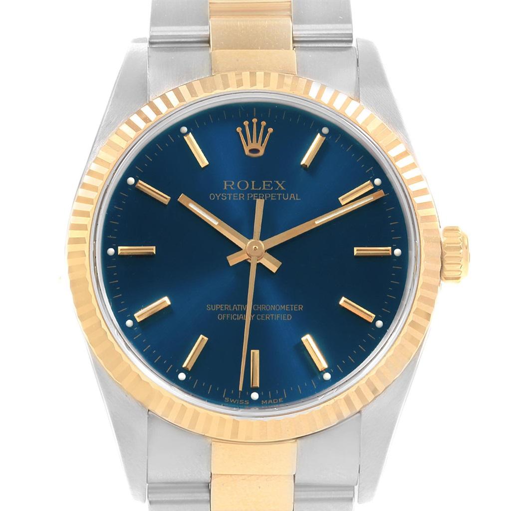 Rolex Oyster Perpetual Steel Yellow Gold Blue Dial Men’s Watch 14233 In Excellent Condition For Sale In Atlanta, GA