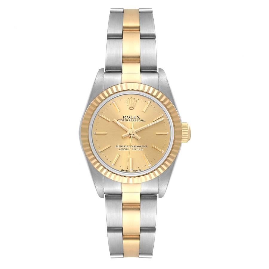 Rolex Oyster Perpetual Steel Yellow Gold Champagne Dial Ladies Watch 76193. Officially certified chronometer self-winding movement. Stainless steel oyster case 24.0 mm in diameter. Rolex logo on a 18k yellow gold crown. 18k yellow gold fluted bezel.