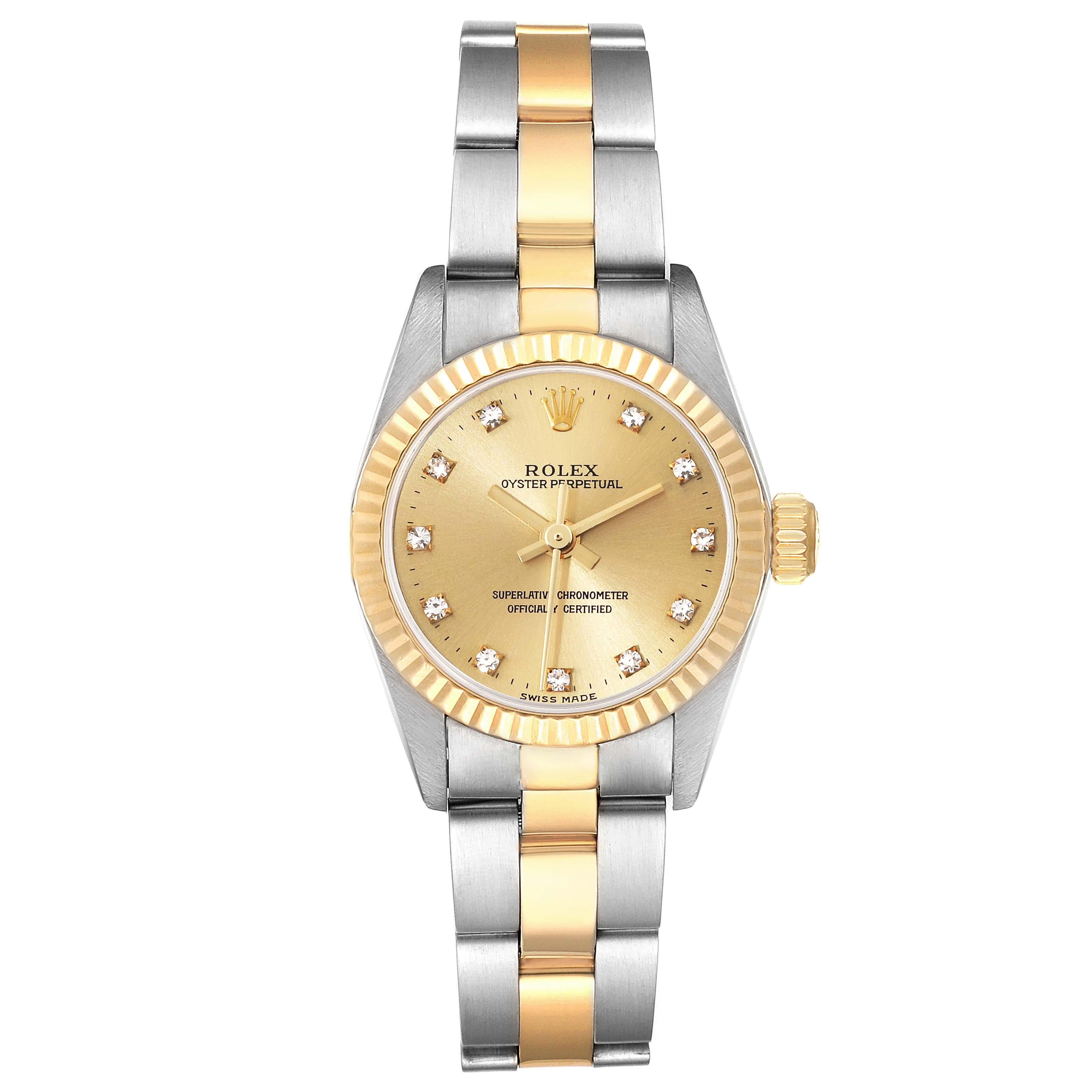 Rolex Oyster Perpetual Steel Yellow Gold Diamond Dial Ladies Watch 67193. Officially certified chronometer automatic self-winding movement. Stainless steel oyster case 24.0 mm in diameter. Rolex logo on an 18k yellow gold crown. 18k yellow gold