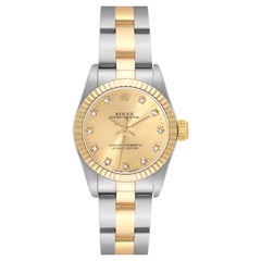 Rolex Oyster Perpetual Montre pour femme avec cadran en acier, or jaune et diamant 67193