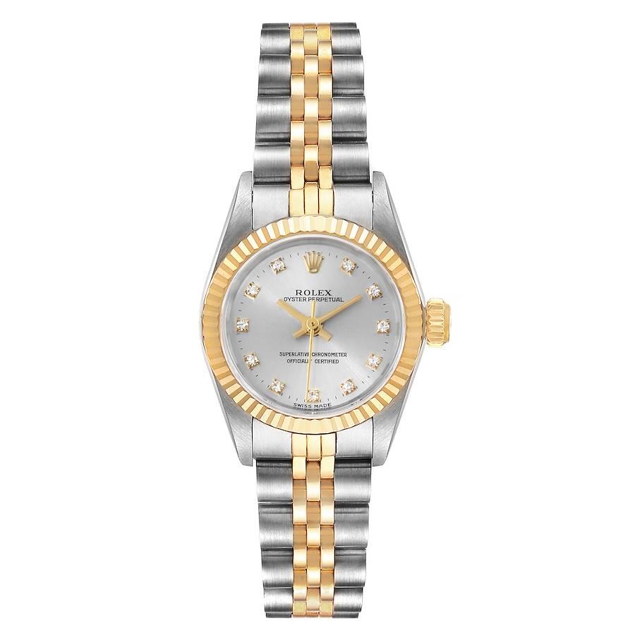 Rolex Oyster Perpetual Steel Yellow Gold Diamond Ladies Watch 67193. Officially certified chronometer self-winding movement. Stainless steel oyster case 24.0 mm in diameter. Rolex logo on a 18k yellow gold crown. 18k yellow gold fluted bezel.