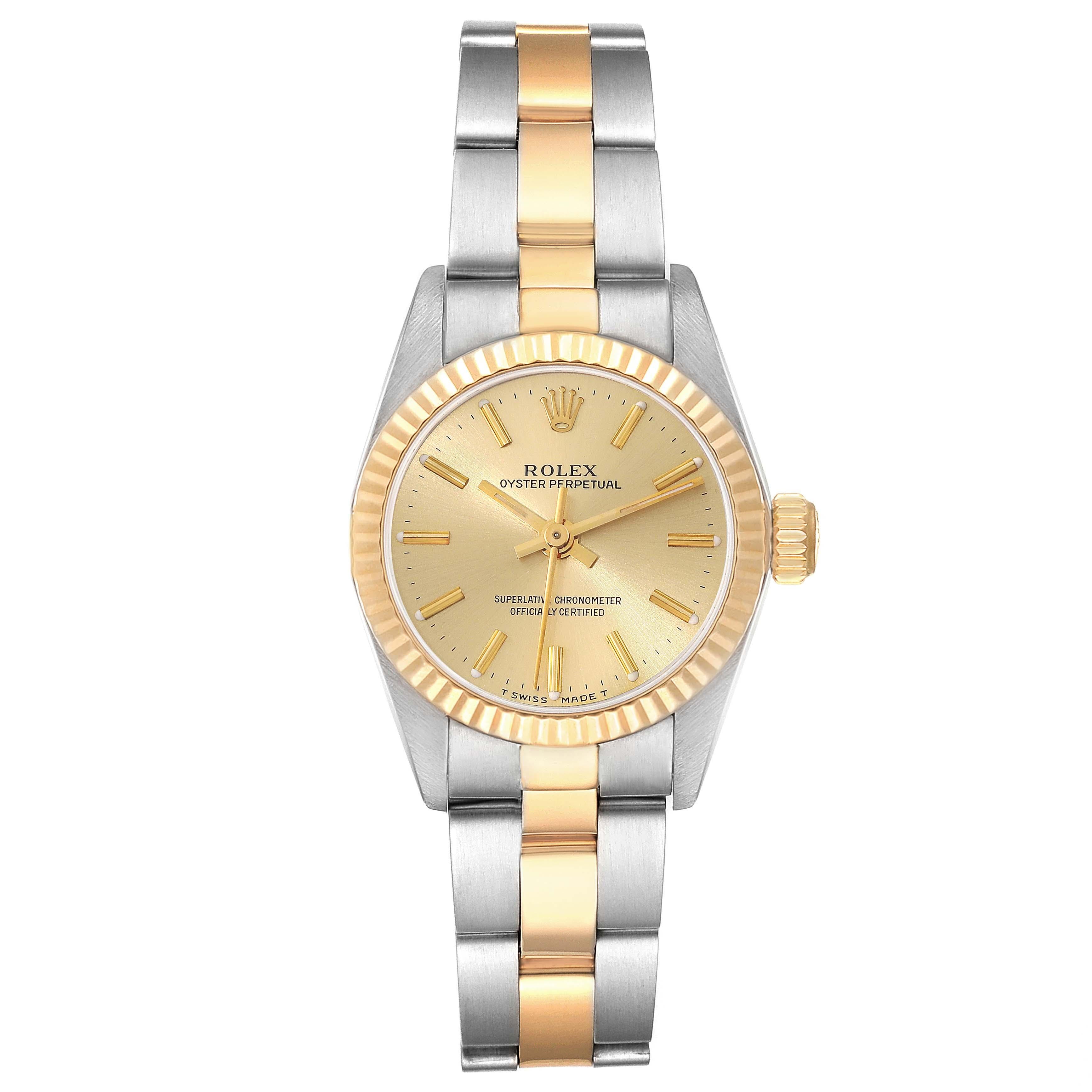 Rolex Oyster Perpetual Steel Yellow Gold Ladies Watch 67193. Officially certified chronometer automatic self-winding movement. Stainless steel oyster case 24.0 mm in diameter. Rolex logo on an 18k yellow gold crown. 18k yellow gold fluted bezel.
