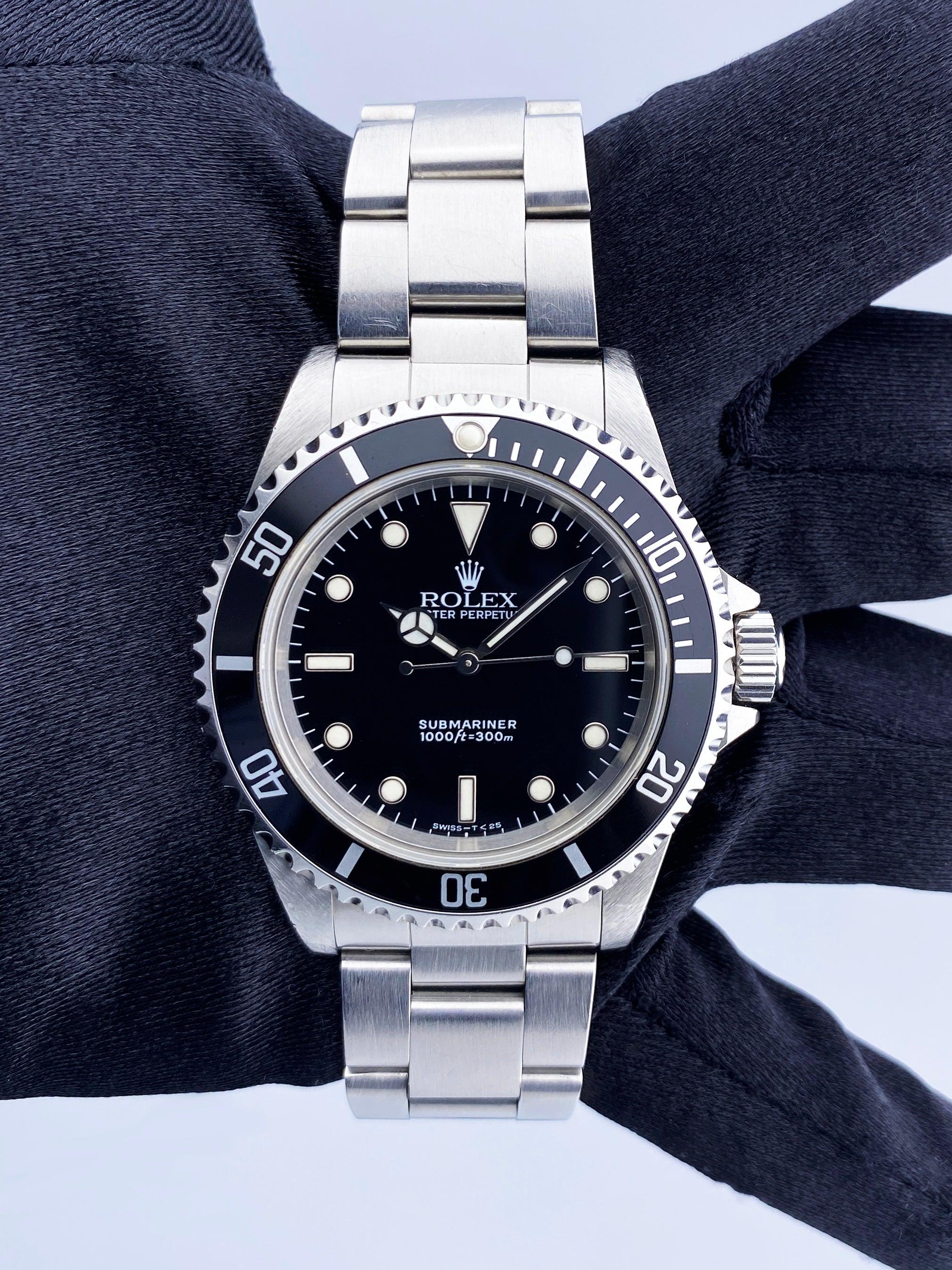 Rolex Oyster Perpetual Submariner No Date 14060 Mens Watch. 40mm stainless steel case. Unidirectional rotating bezel with black bezel insert. Black dial with luminous Mercedes steel hands and index hour marker. Stainless steel Oyster bracelet with a