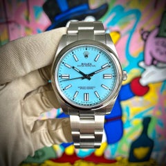 Rolex Montre Oyster Perpetual avec cadran turquoise 124300
