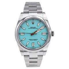 Montre Rolex Oyster Perpetual à cadran bleu turquoise en acier inoxydable 124300