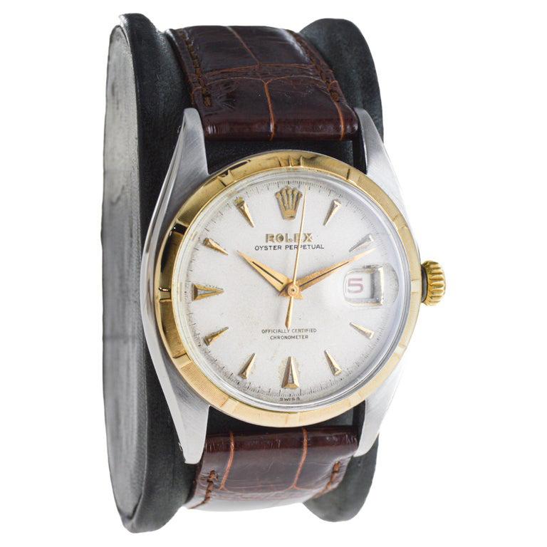 FACTORY / HOUSE: Rolex Watch Company
STYLE / REFERENCE: Oyster Perpetual / Reference 6105
METAL / MATERIAL: Two Tone Stainless Steel & Gold
CIRCA / YEAR: 1953
DIMENSIONS / SIZE: Length 44mm X Diameter 36mm
MOVEMENT / CALIBER: Perpetual Winding / 20