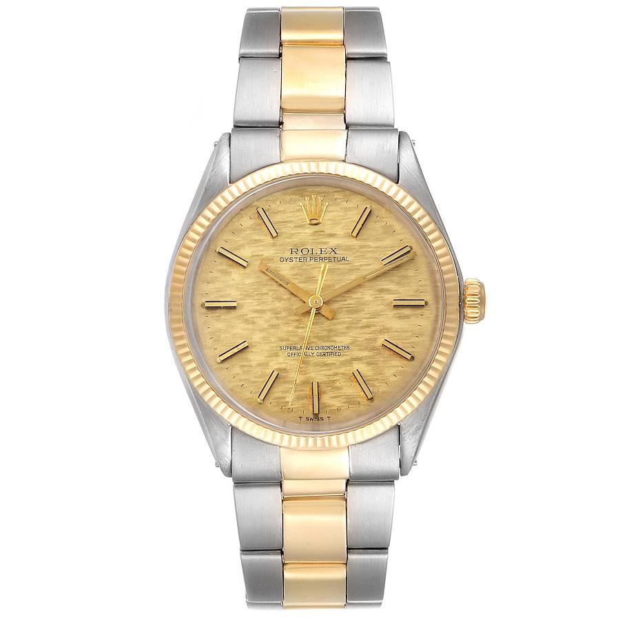 Rolex Oyster Perpetual Vintage Steel Yellow Gold Mens Watch 1002. Officially certified chronometer self-winding movement. Stainless steel and Yellow gold oyster case 34.0 mm in diameter. Rolex logo on a crown. Yellow gold fluted bezel. Acrylic