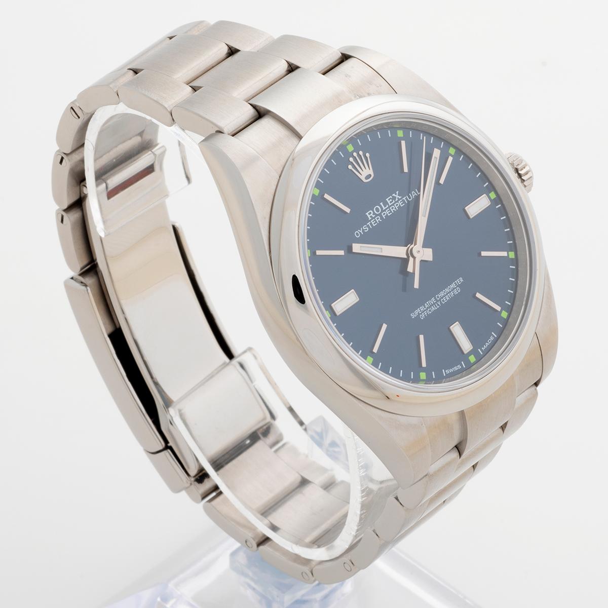 This discontinued 39mm Rolex Oyster Perpetual, reference 114300, was launched in 2015 with unusual and attractive new dial variants, this one benefitting from the popular and rare 'blue sunray' dial. Featuring a stainless steel 39mm case and Oyster
