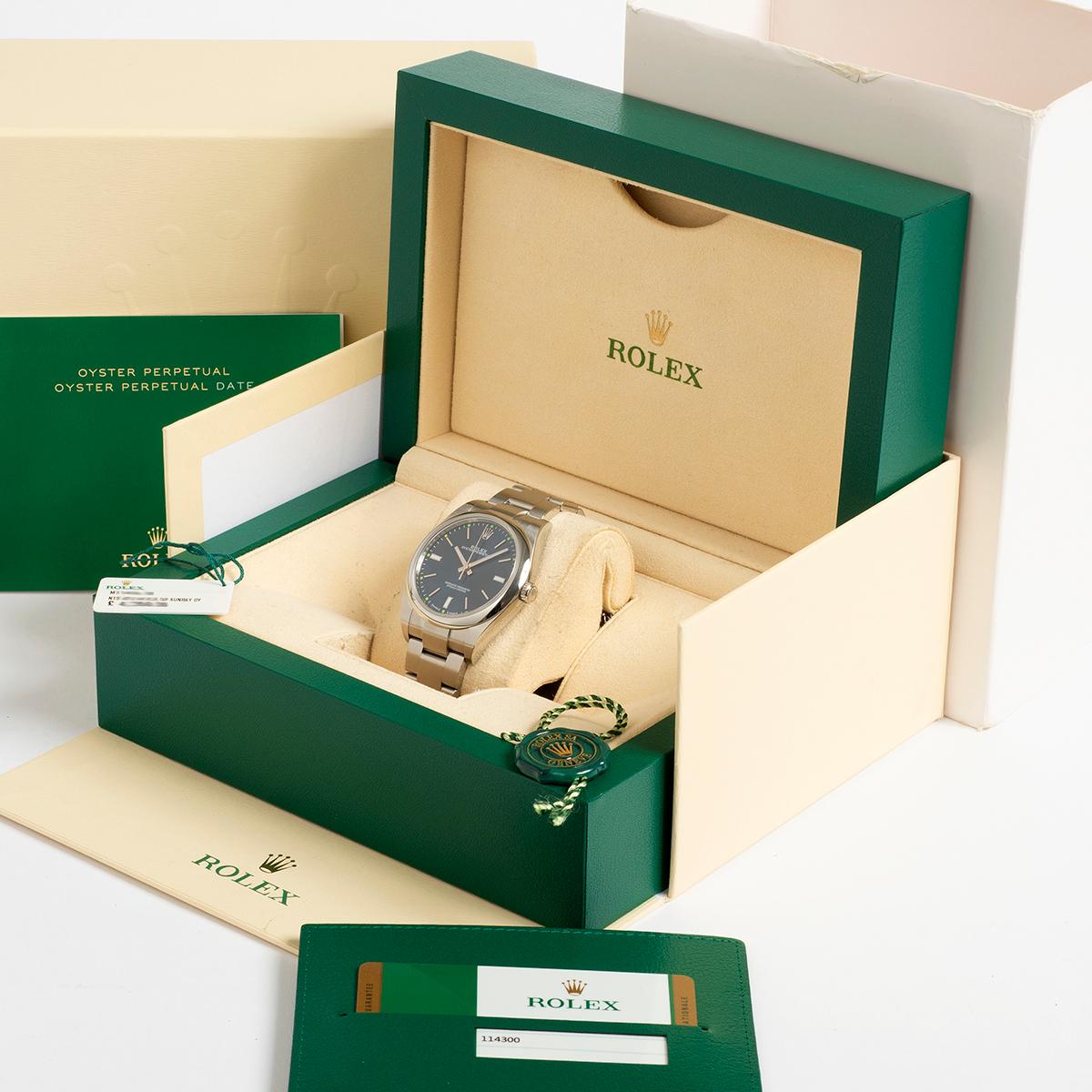Rolex Oyster Perpetual Wristwatch Ref 114300. 'Blue Sunray Dial', Full Set, 2019 1