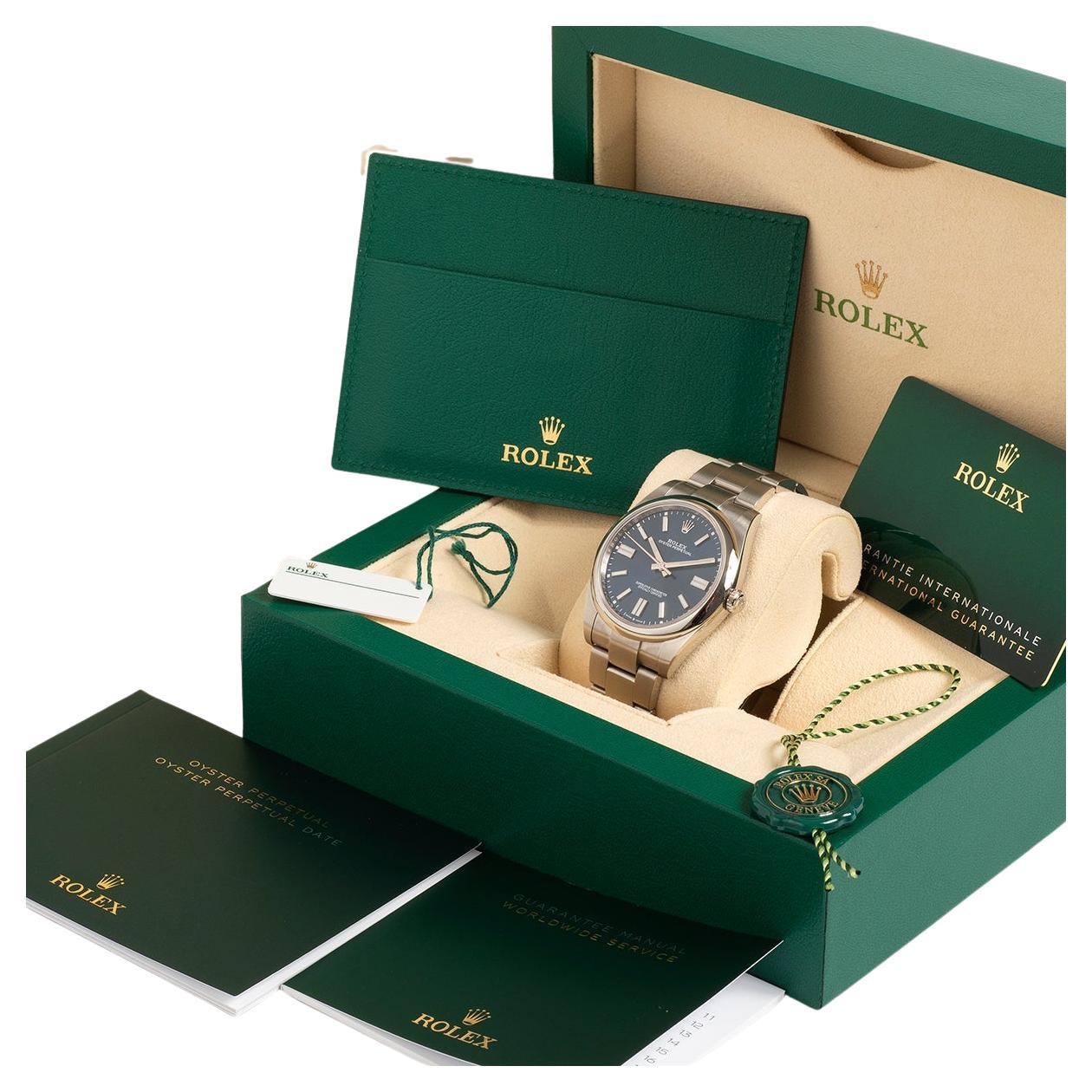 Il nostro Rolex Oyster Perpetual referenza 124300 ha una cassa da 41 mm in acciaio inossidabile con bracciale Oyster in acciaio inossidabile e quadrante blu. Presentato in condizioni eccezionali con solo leggeri segni d'uso da nuovo. Questo