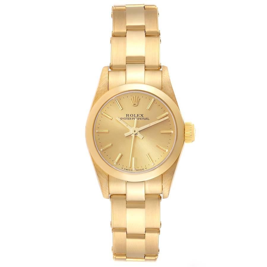 Rolex Oyster Perpetual Yellow Gold Champagne Dial Ladies Watch 67188. Officially certified chronometer automatic self-winding movement. 18k yellow gold oyster case 24 mm in diameter. Rolex logo on the crown. 18k yellow gold smooth bezel. Scratch