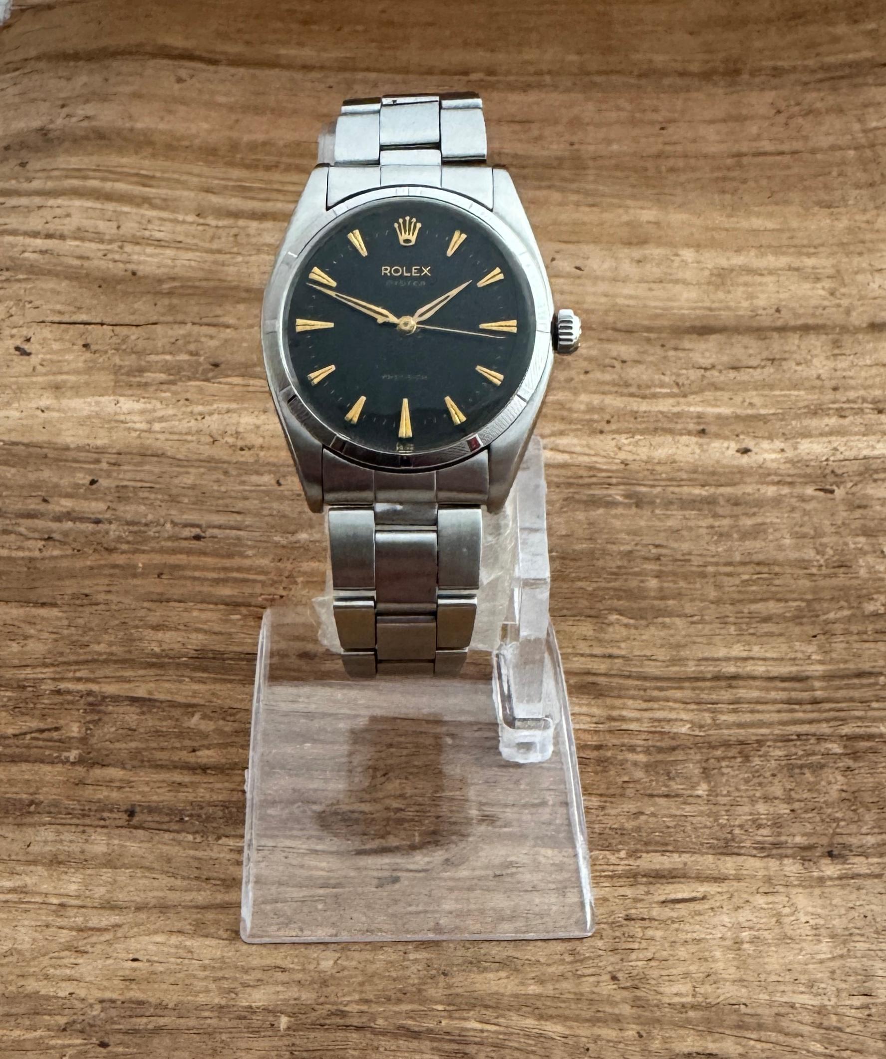Brand : Rolex

Model: Oysterdate Precision

Reference number: 6423

Country Of Manufacture: Switzerland

Movement: Hand Wind

Case Material: Stainless Steel

Measurements :34mm diameter (excluding crown )

Band Type : Stainless Steel With Marked