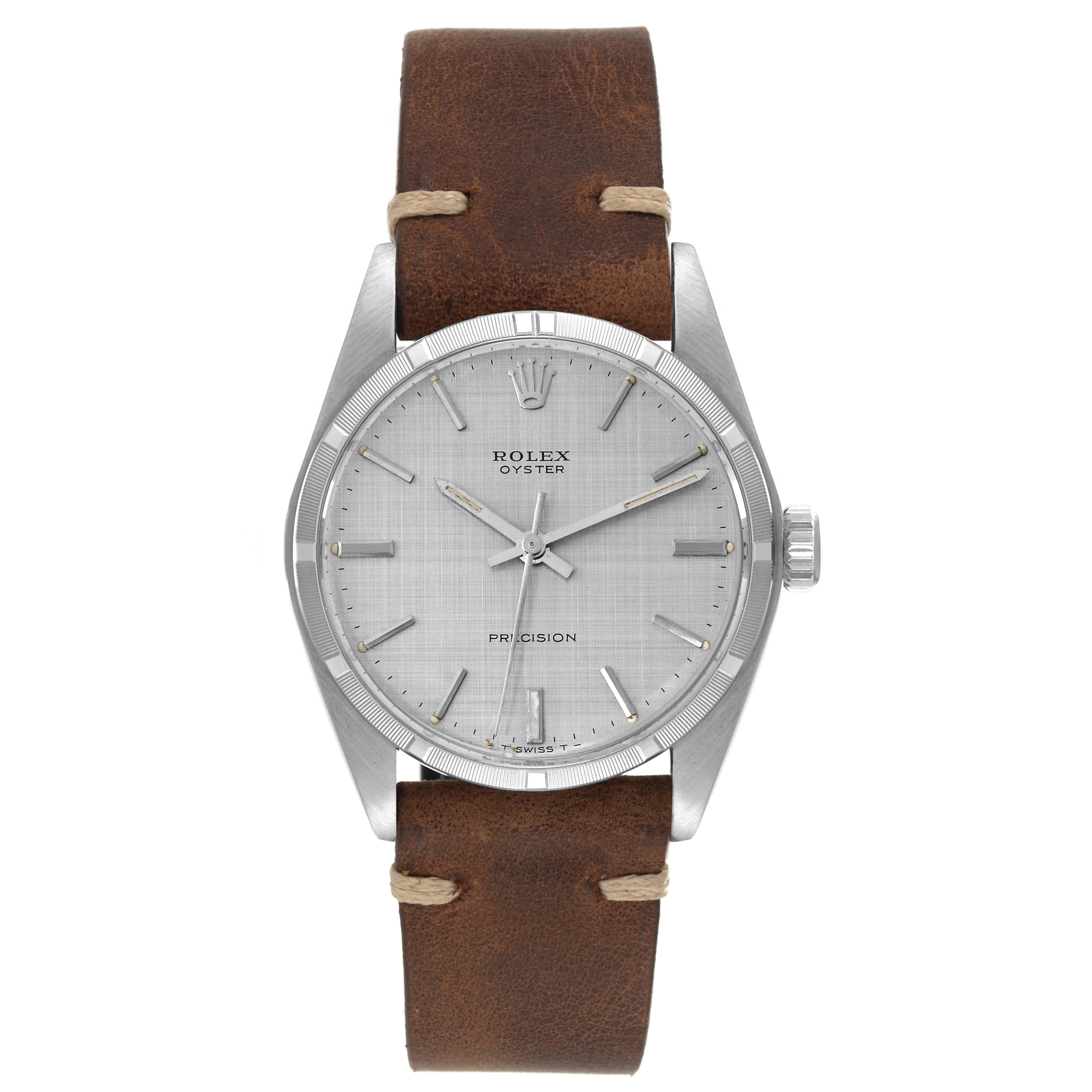 Rolex Oyster Precision Silver Linen Dial Vintage Steel Mens Watch 6427. Manual-winding movement. Stainless steel oyster case 35.0 mm in diameter. Rolex logo on the crown. Stainless steel engine turned bezel. Domed acrylic crystal. Silver linen dial