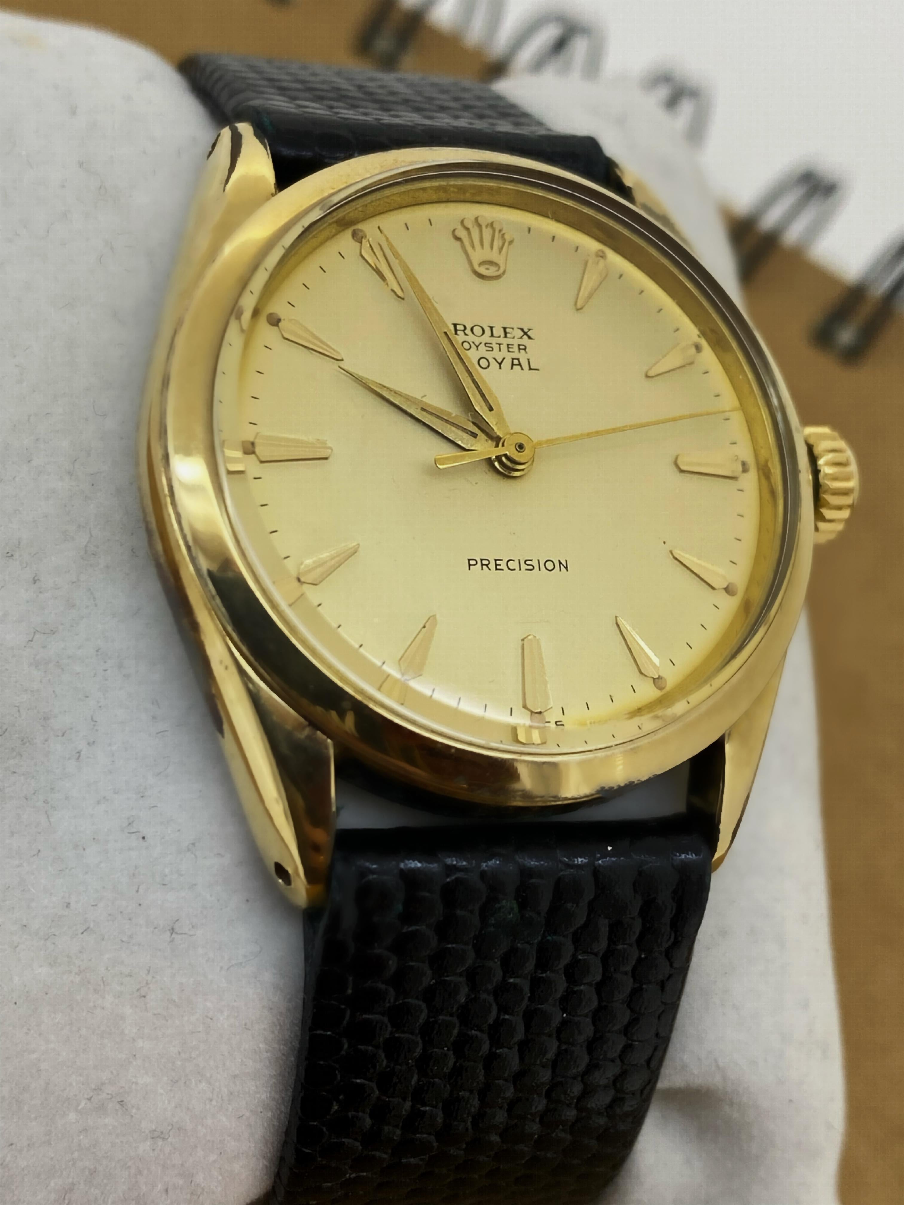 This fine & rare vintage Rolex Oyster Royal wristwatch, 
dating back to circa 1961, featuring: 

35mm 18K Gold Electroplated S/Steel Oyster Case, 
with smooth bezel 
37mm including the original signed screw-down crown, 
Case is signed & bearing a