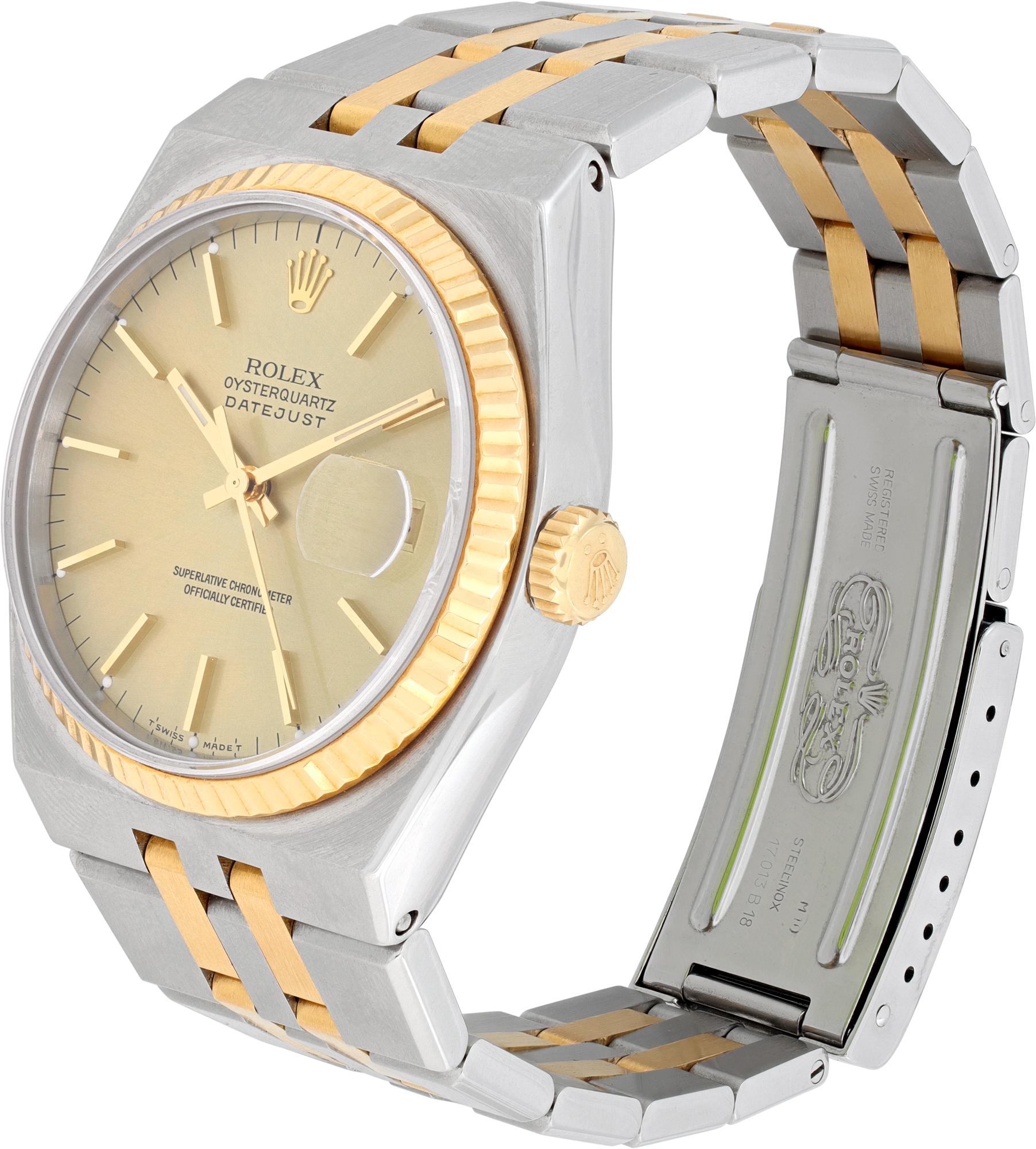 Rolex OysterQuartz in 18k & stainless steel. Quartz with sweep seconds and date. 36 mm case size. Comes with Rolex service card. **Bank wire only at this price** Ref 17013. Circa 1988 Fine Pre-owned Rolex Watch.

 Certified preowned Vintage Rolex