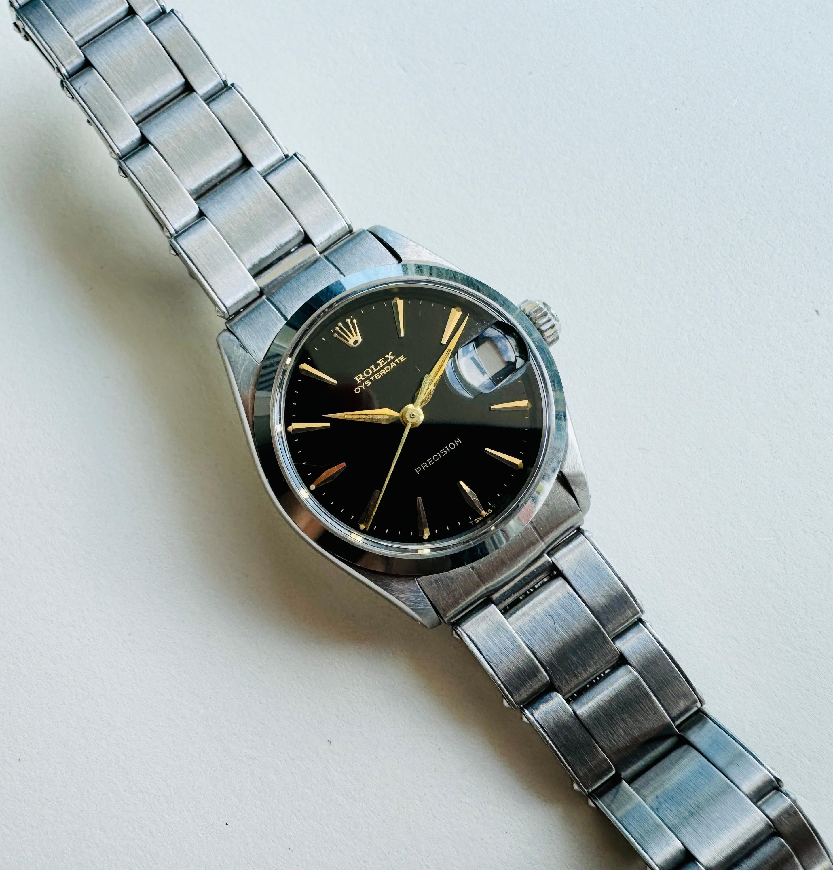 Marke: ROLEX

Modell: Auster Datum

Referenznummer: 6466

Preis: 2200 USD

Land der Herstellung: Schweiz

Uhrwerk: Handaufzug

MATERIAL des Gehäuses: Rostfreier Stahl

Abmessungen: Gehäusebreite: 31 mm. (ohne Krone)

Band Typ : Rostfreier