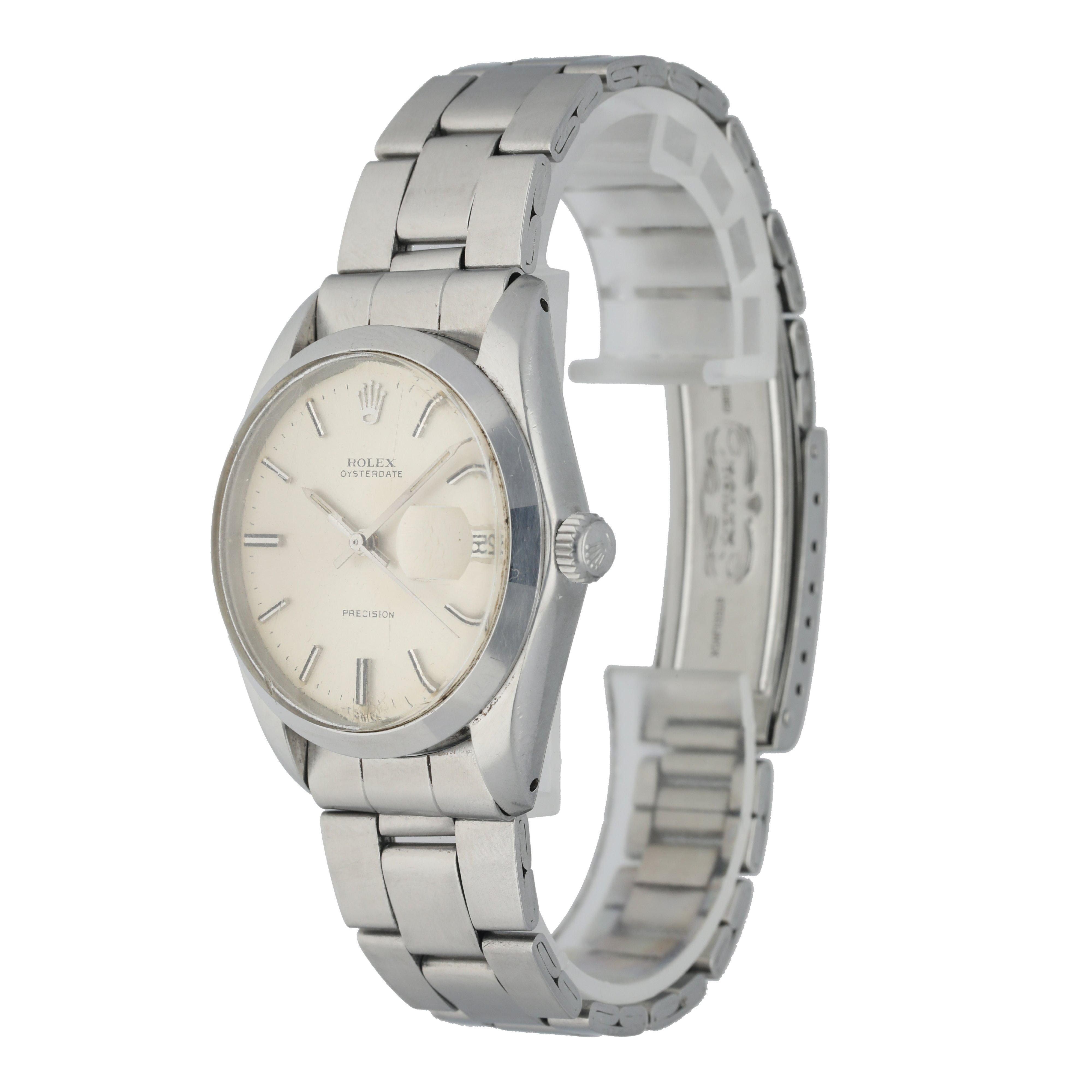 Rolex OysterDate Precision 6694 Vintage Men's Watch. 
34mm stainless steel case with a smooth bezel. 
Silver dial with silver-tone hands and indexes. 
Minute markers on the outer dial. 
Date Display at the 3 o'clock position. 
vintage crimped