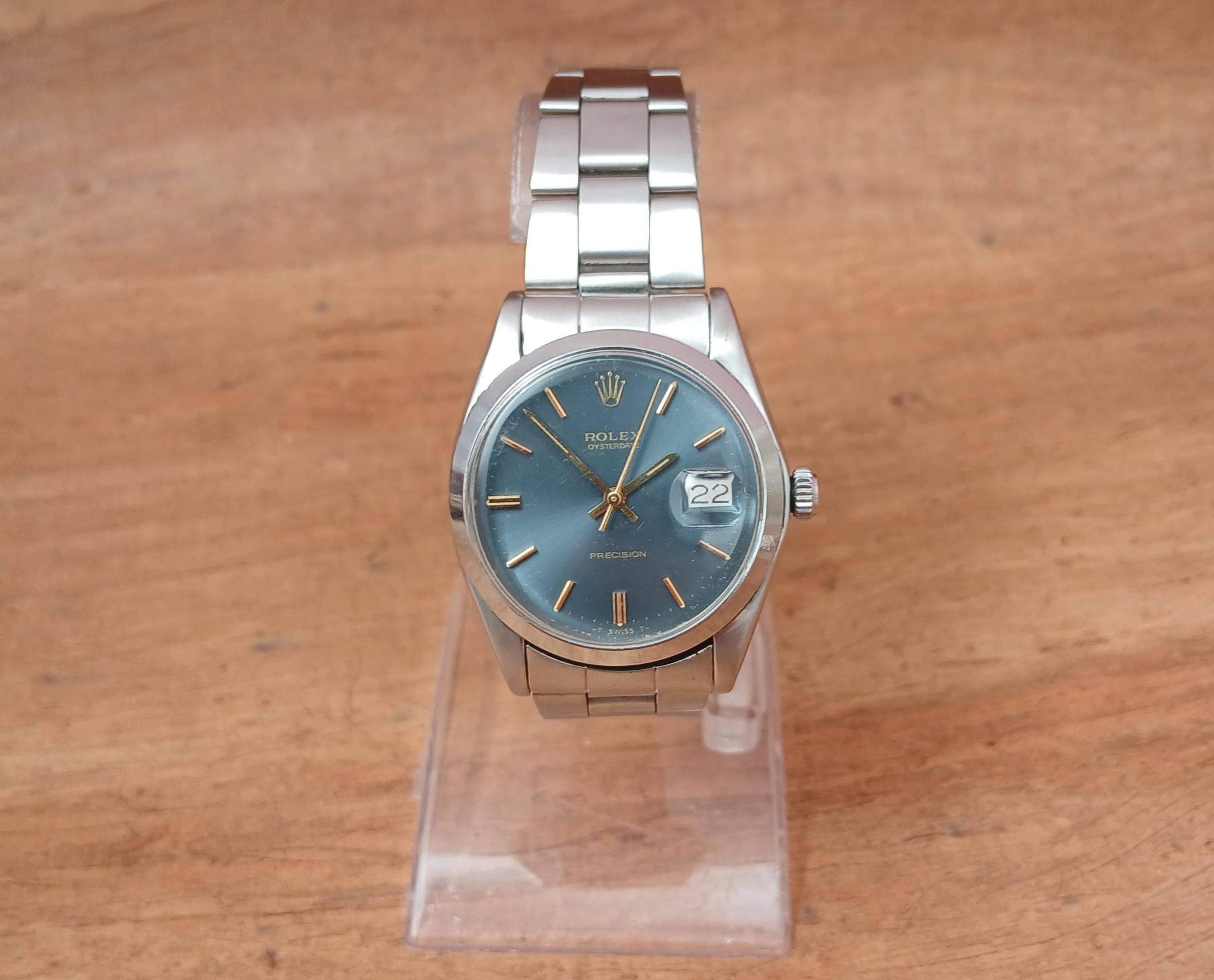 Marchio: Rolex

Model: Oysterdate Precision

Numero di riferimento: 6694

Paese di produzione: Svizzera

Movimento: Carica manuale

Materiale della cassa: Acciaio inossidabile

Misure : Larghezza della cassa: 35 mm. (senza corona)

Tipo di banda :