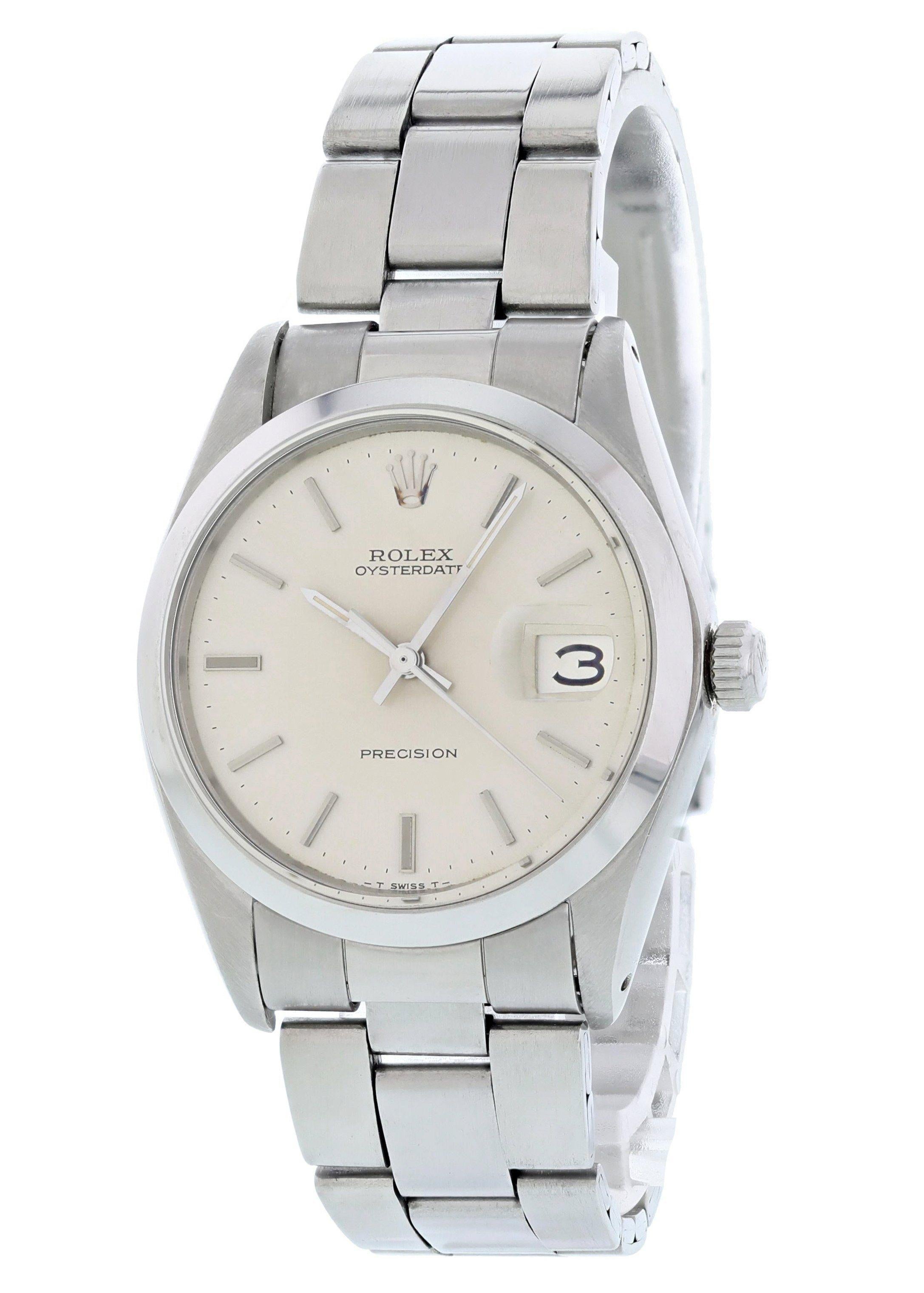 Rolex Oysterdate Precision 6694 Vintage Men's Watch. 34 mm stainless steel case with a smooth bezel. Silver dial with steel hands and indexes. Date aperture at the 3 o'clock Position. Stainless steel bracelet with a fold over clasp. Will fit up to a