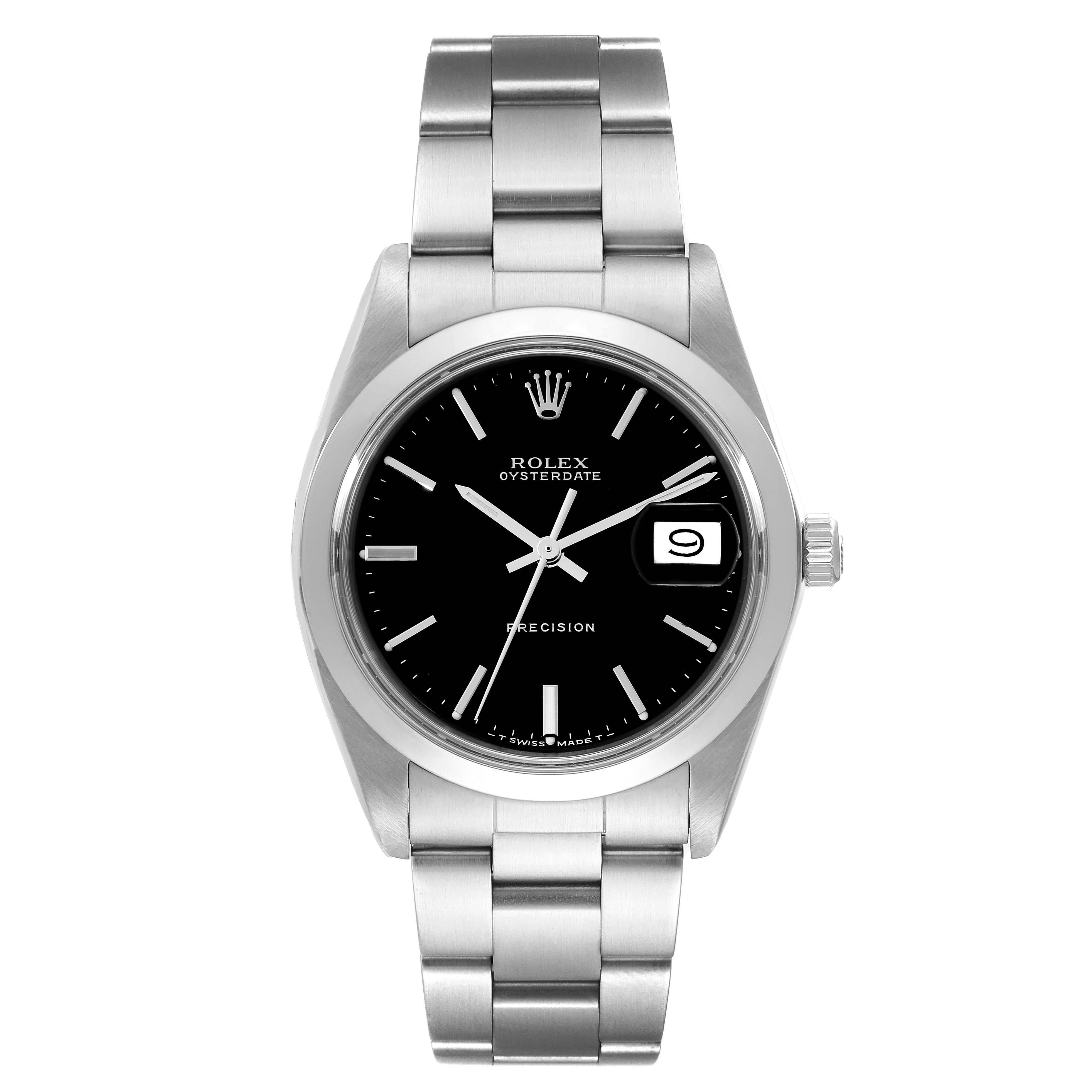 Rolex OysterDate Precision Black Dial Steel Vintage Mens Watch 6694. Manual-winding movement. Stainless steel oyster case 35.0 mm in diameter. Rolex logo on the crown. Stainless steel smooth bezel. Acrylic crystal with cyclops magnifier. Black dial