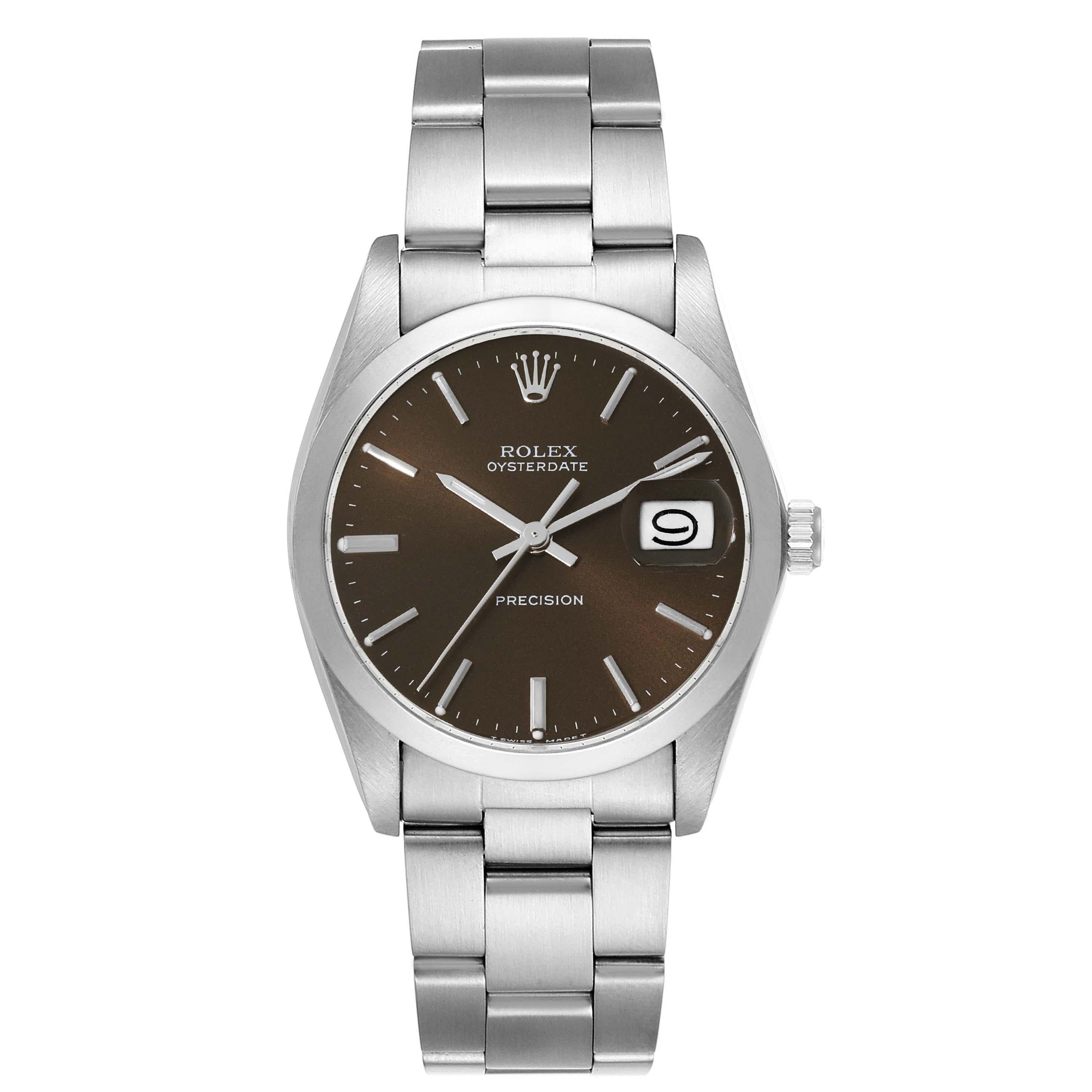 Rolex OysterDate Precision Brown Dial Steel Vintage Mens Watch 6694. Manual-winding movement. Stainless steel oyster case 35.0 mm in diameter. Rolex logo on the crown. Stainless steel smooth bezel. Acrylic crystal with cyclops magnifier. Brown dial