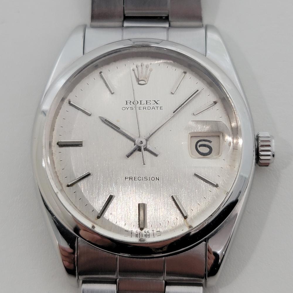 Vintage icon, Men's all-stainless steel Rolex Oysterdate Precision 6694 hand-wind dress watch, c.1966, all original, in excellent working condition. Verified authentic by a master watchmaker. Gorgeous Rolex signed silver dial, applied baton index
