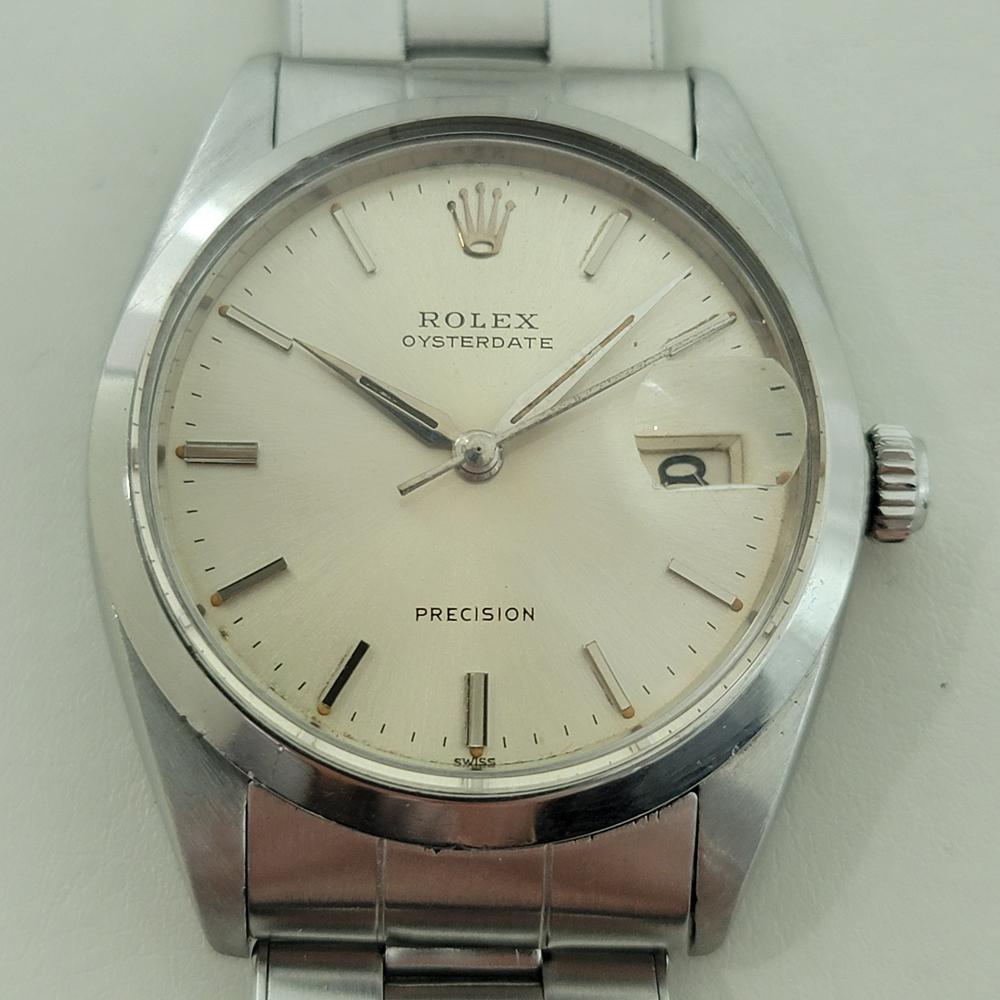 Vintage icon, Men's all-stainless steel Rolex Oysterdate Precision 6694 hand-wind dress watch, c.1962, all original, in excellent working condition. Verified authentic by a master watchmaker. Gorgeous Rolex signed silver dial, applied baton index