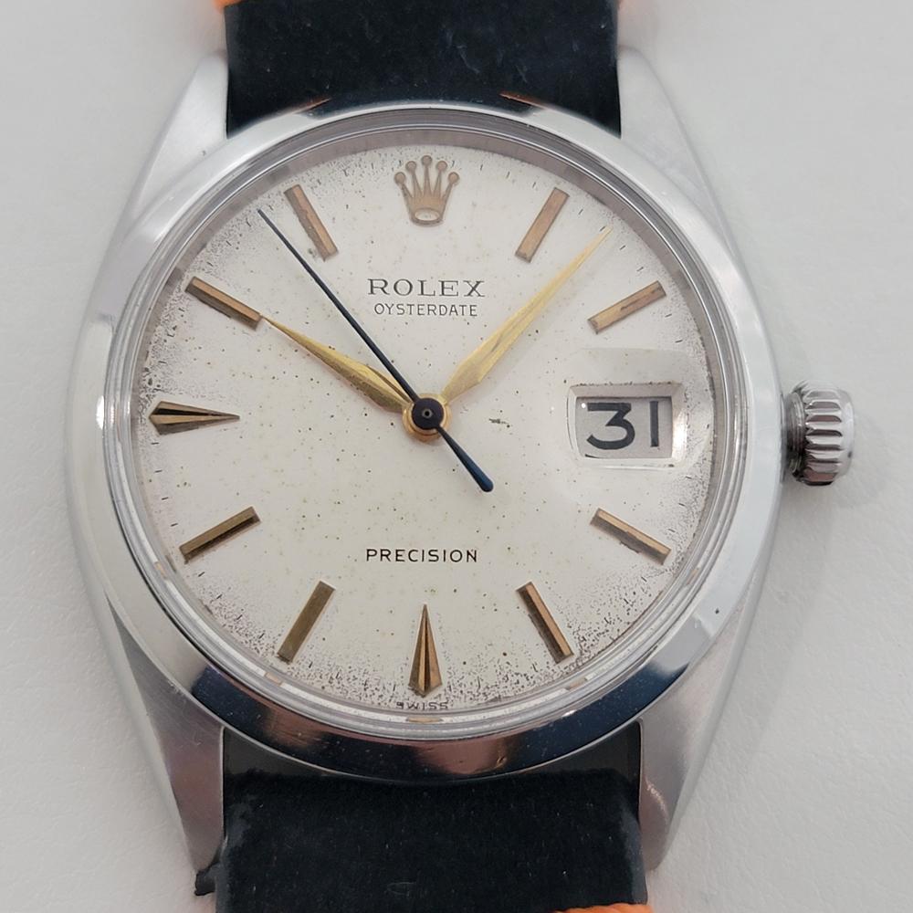 Classique iconique, la Rolex Oysterdate Precision ref. 6694 à remontage manuel, C.C., en excellent état de marche. Vérifié authentique par un maître horloger. Magnifique cadran signé Rolex, index bâton et poignard appliqués en or, aiguilles des