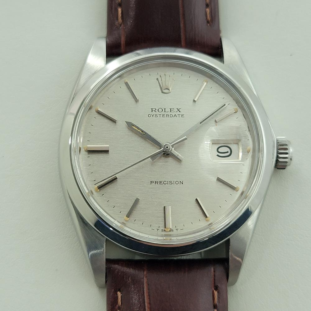 Iconic classic, Men's Rolex ref.6694 Oysterdate Precision hand-wind dress watch, c.1971, in excellent working condition. Verified authentic by a master watchmaker. Gorgeous Rolex signed silver dial, applied baton index hour markers, silver Rolex