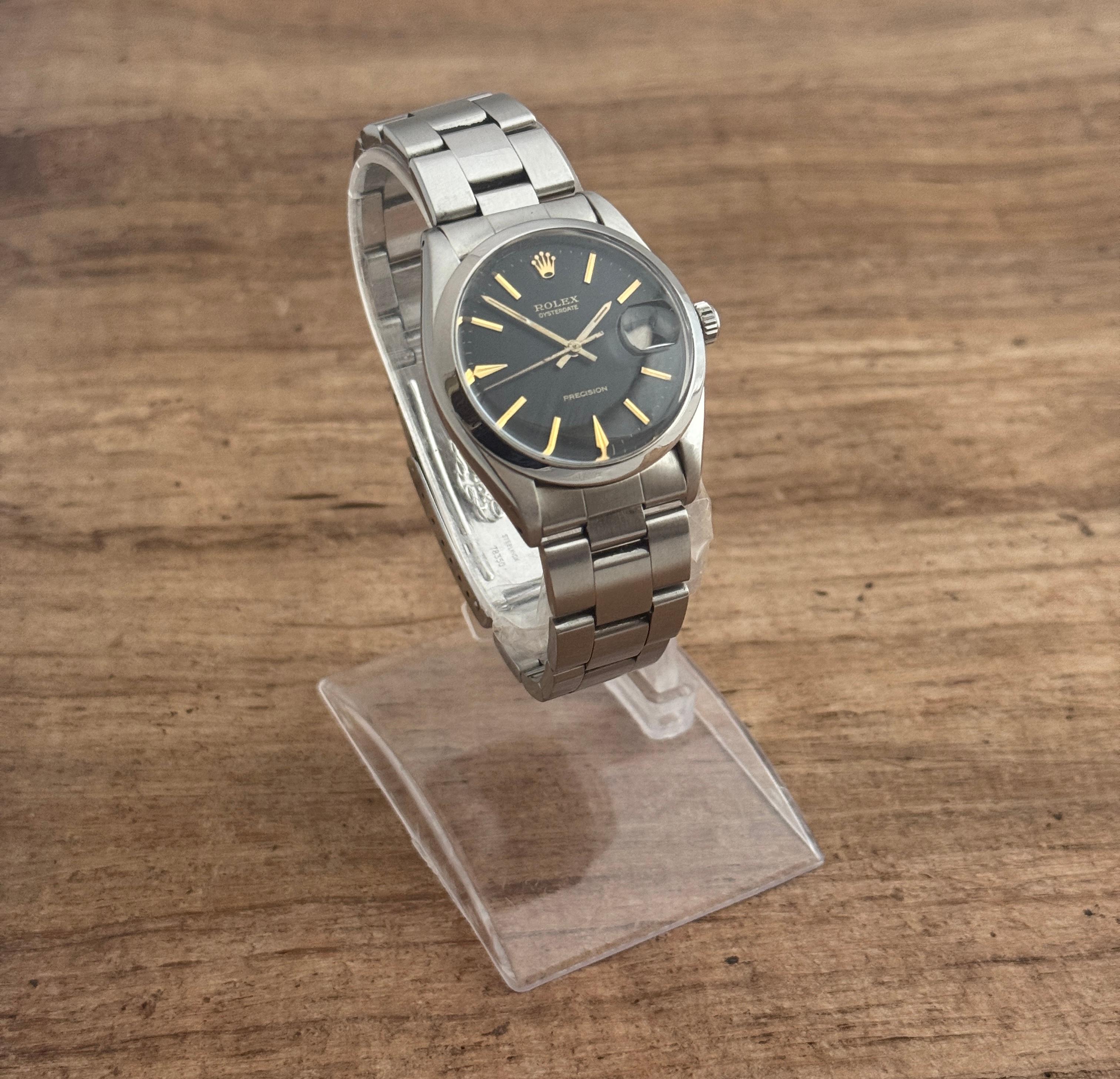 Marke : Rolex

Modell: Austerndatum Präzision

Referenznummer: 6694

Land der Herstellung: Schweiz

Uhrwerk: Handaufzug

MATERIAL des Gehäuses: Rostfreier Stahl

Maße: 34mm Durchmesser (ohne Krone)

Band Typ : Edelstahl mit markierter Schließe

Band