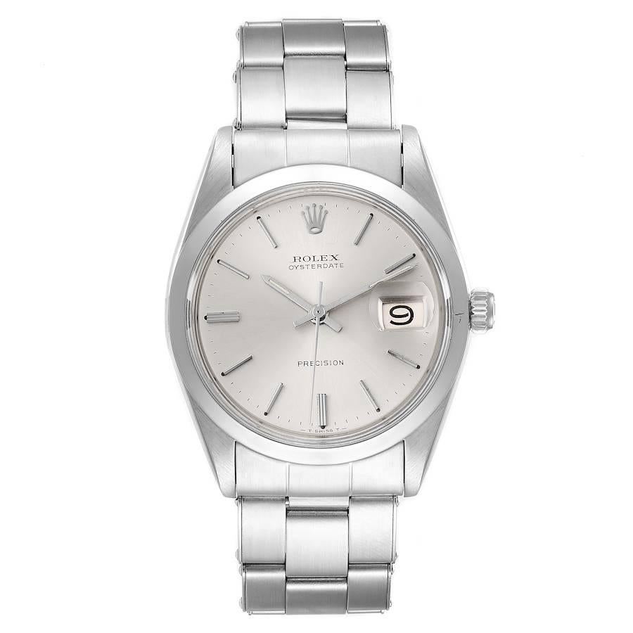 Rolex OysterDate Precision Silver Dial Steel Vintage Mens Watch 6694. Manual-winding movement. Stainless steel oyster case 35.0 mm in diameter. Rolex logo on a crown. Stainless steel smooth domed bezel. Acrylic crystal with cyclops magnifier. Silver