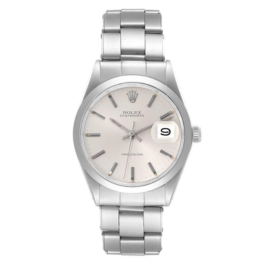 Rolex OysterDate Precision Silver Dial Steel Vintage Mens Watch 6694. Manual-winding movement. Stainless steel oyster case 35.0 mm in diameter. Rolex logo on the crown. Stainless steel smooth bezel. Acrylic crystal with cyclops magnifier. Silver