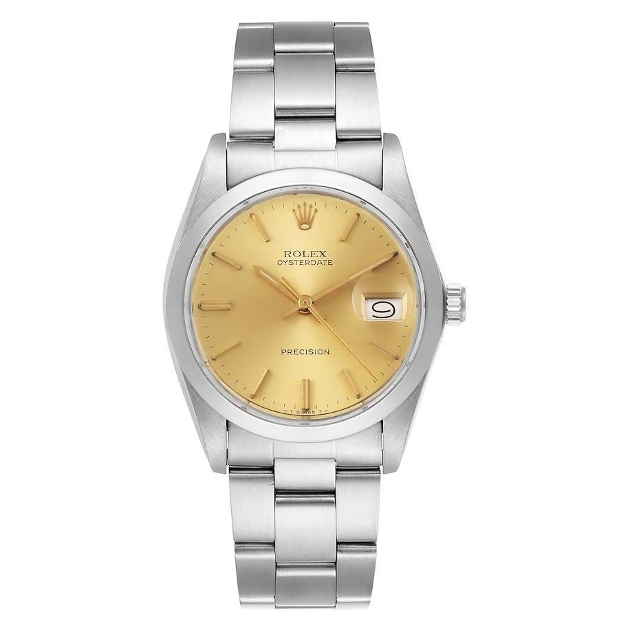 Rolex OysterDate Precision Steel Vintage Mens Watch 6694. Manual-winding movement. Stainless steel oyster case 35.0 mm in diameter. Rolex logo on a crown. Stainless steel smooth domed bezel. Acrylic crystal with cyclops magnifier. Champagne dial